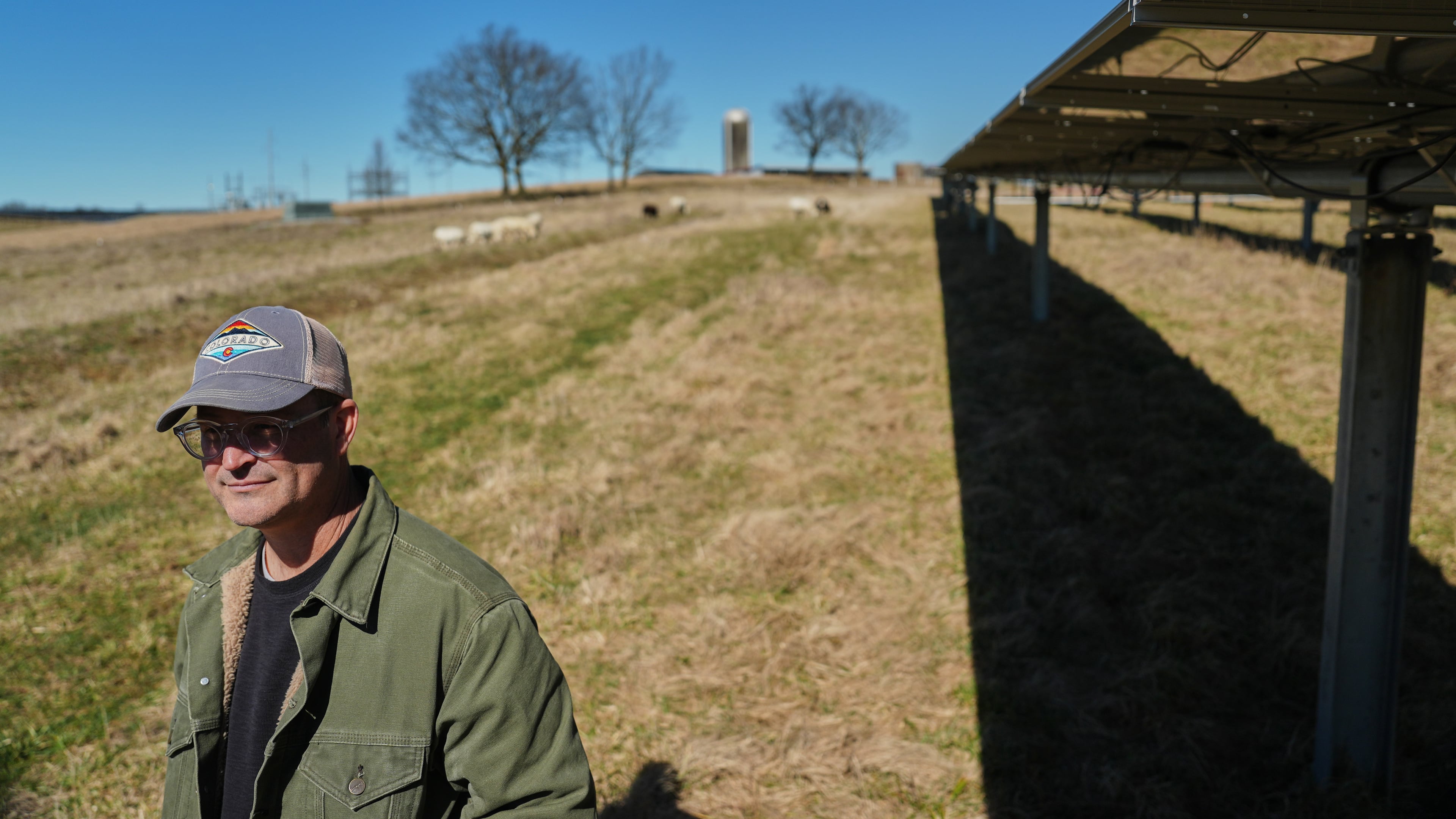 Daniel Bell watches his sheep graze Friday, Feb. 20, 2026, at a farm in Lancaster, Ky. (AP Photo/Joshua A. Bickel)