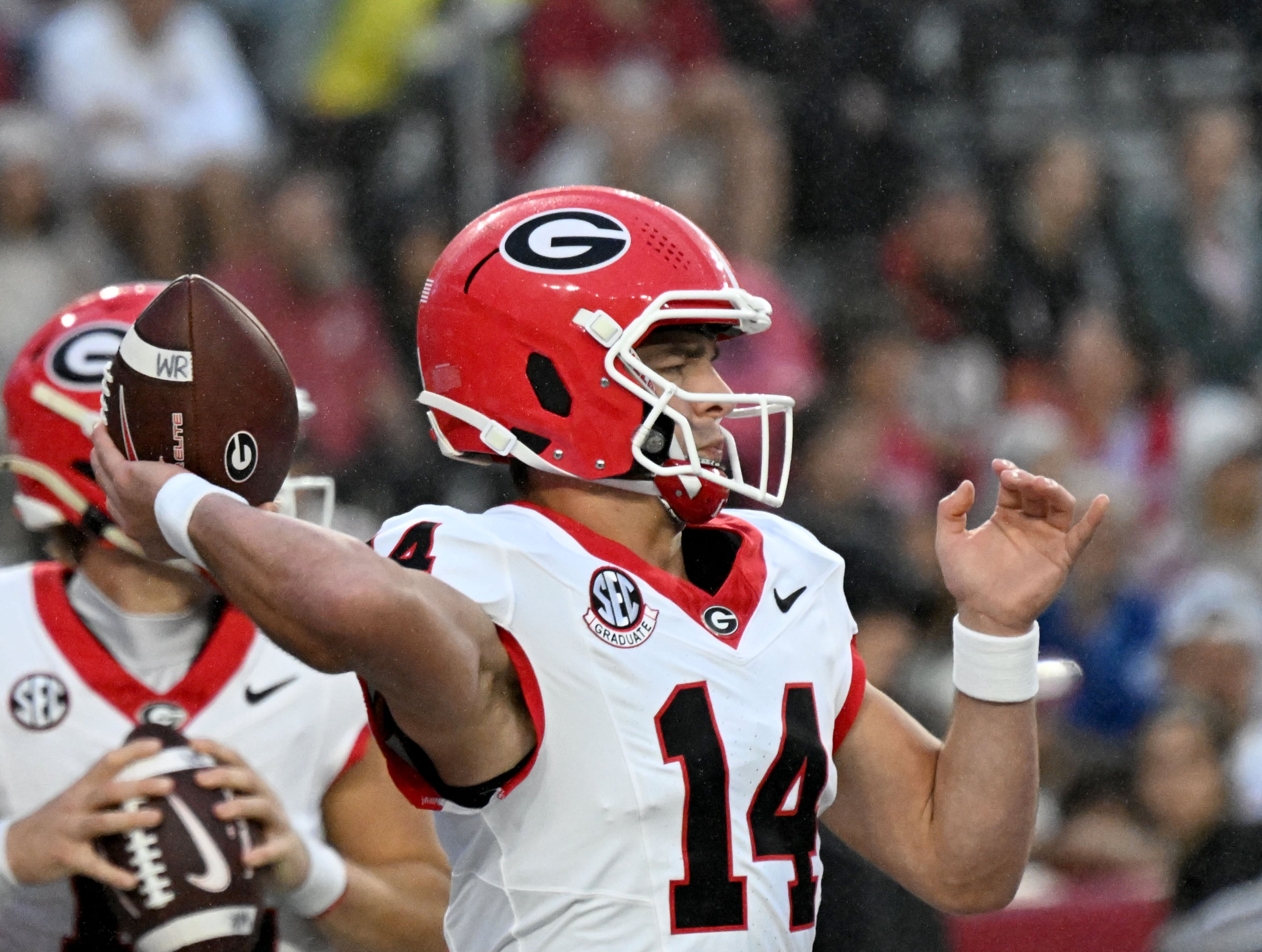 Georgia quarterback Gunner Stockton throws a ball during pregame warmups before an NCAA football game against Alabama at Bryant-Denny Stadium on Saturday, Oct. 10, 2026, in Tuscaloosa, Alabama. (Hyosub Shin/AJC)