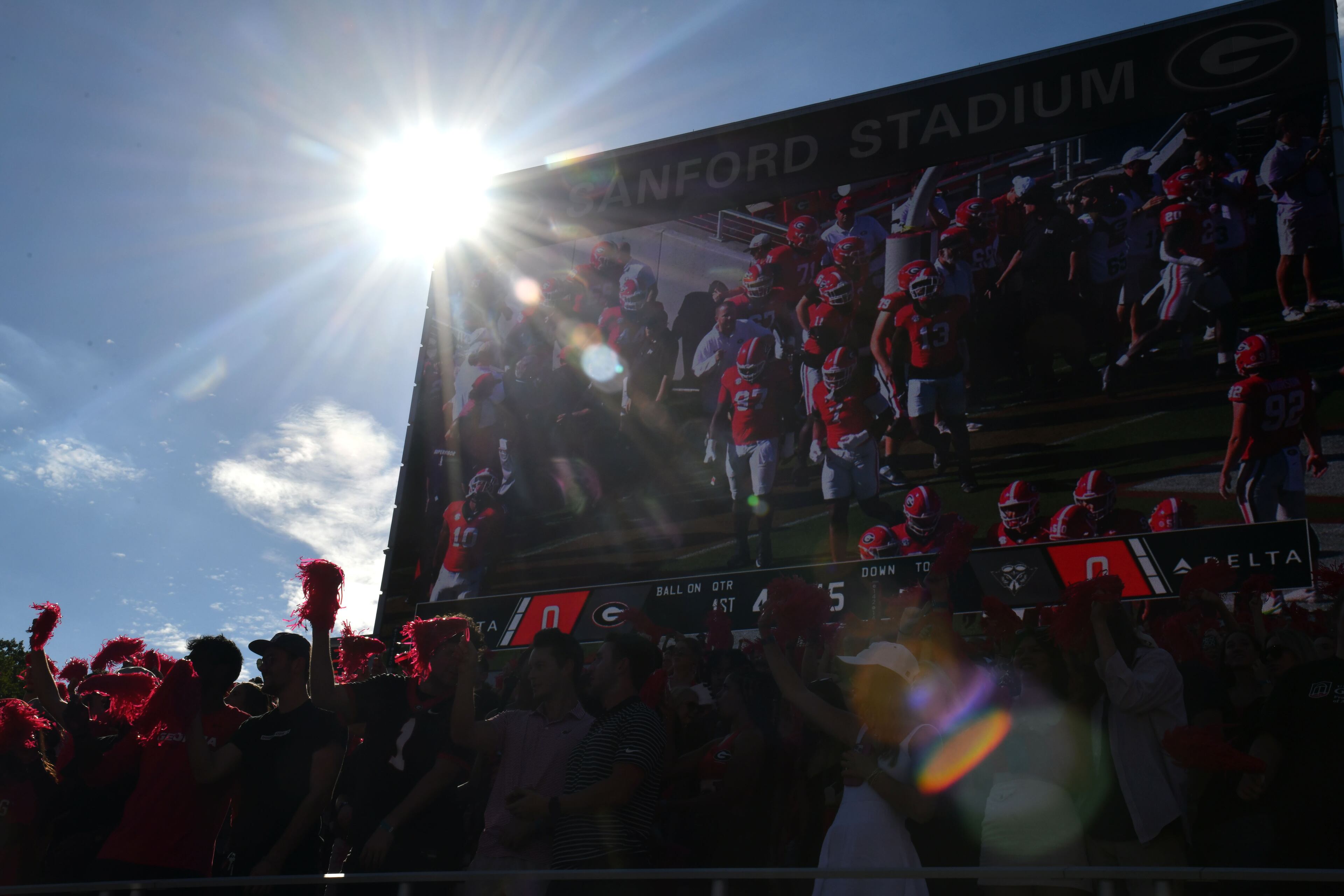 Georgia fans cheer as Georgia players enter the football field before Georgia home opener against UT Martin in an NCAA football game at Sanford Stadium, Saturday, September 2, 2023, in Athens. (Hyosub Shin / Hyosub.Shin@ajc.com)