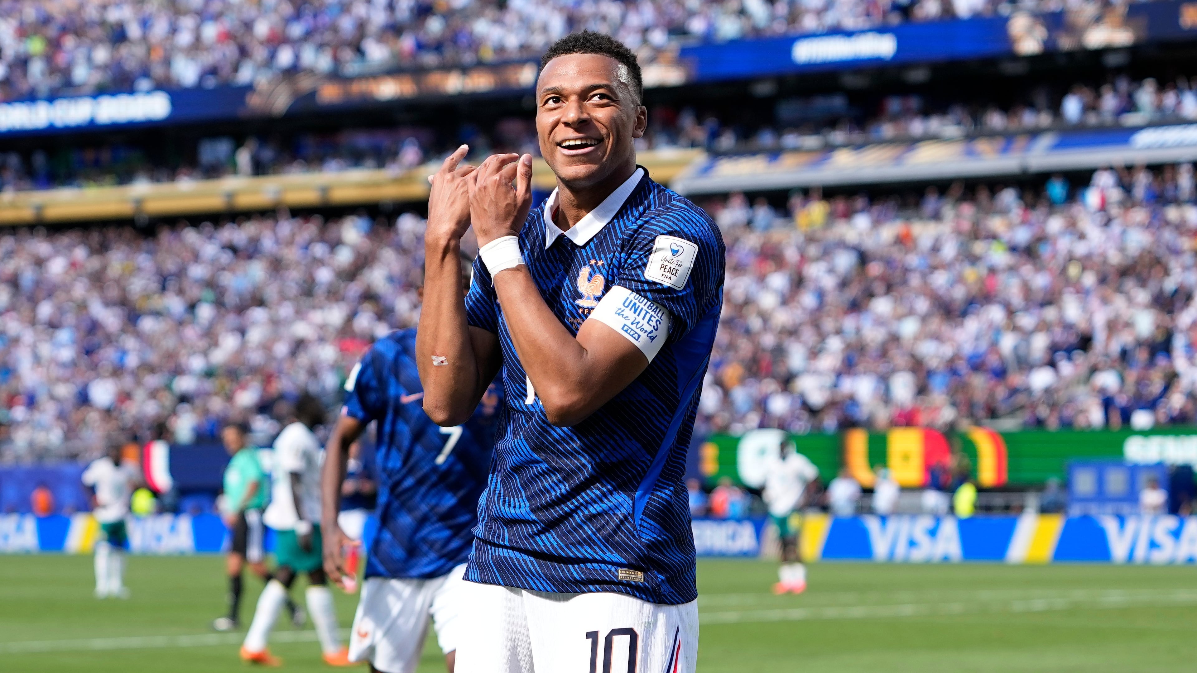 France's Kylian Mbappe celebrates after scoring the opening goal of his team during the World Cup Group I soccer match between France and Senegal in East Rutherford, N.J., near New York, Tuesday, June 16, 2026. (AP Photo/Frank Franklin II)