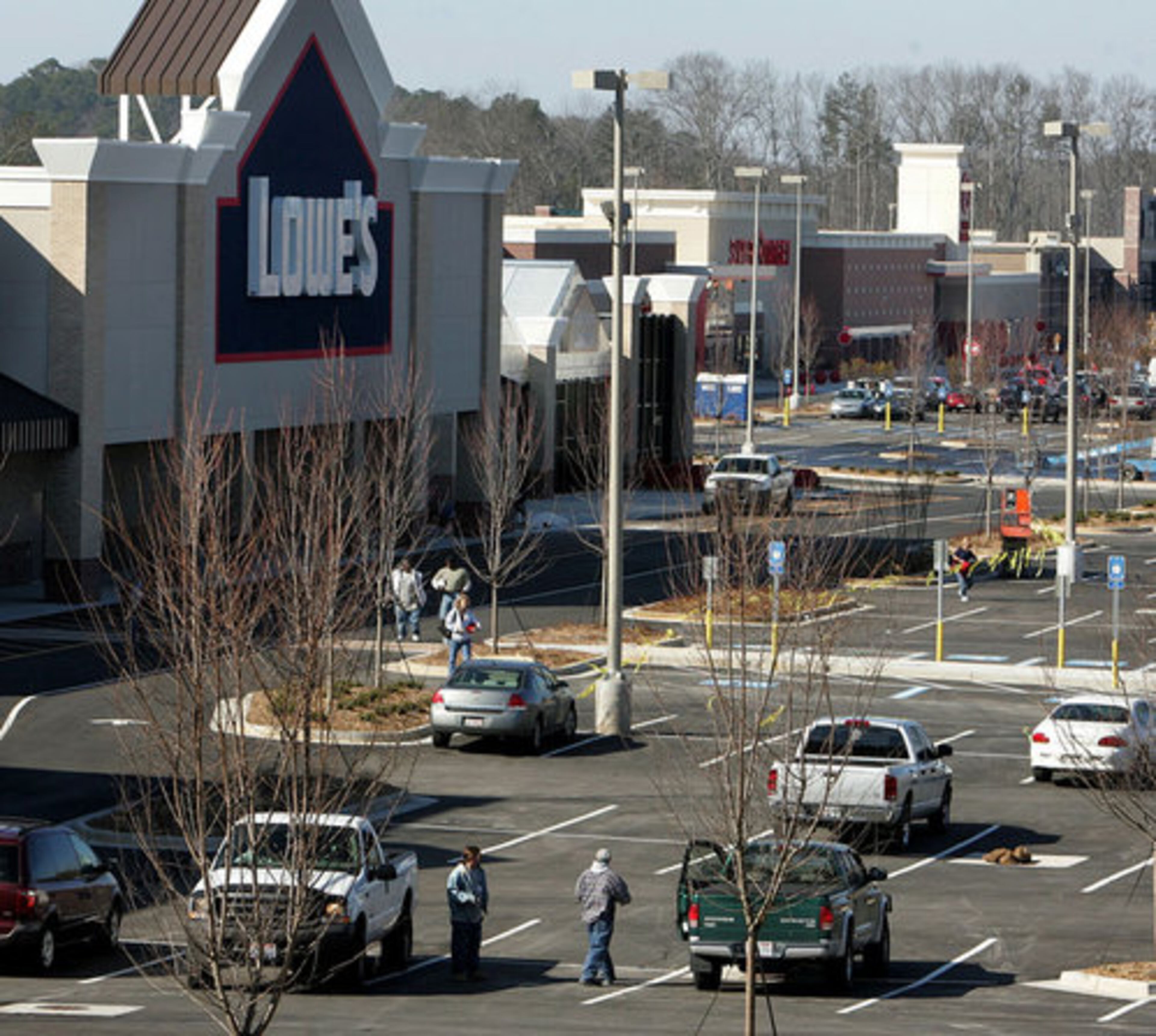 The building of residential housing -- the bread and butter of this bedroom community -- has come to a standstill. But the brand new Canton Marketplace is scheduled to open soon, featuring a Lowe's and Super Target.
