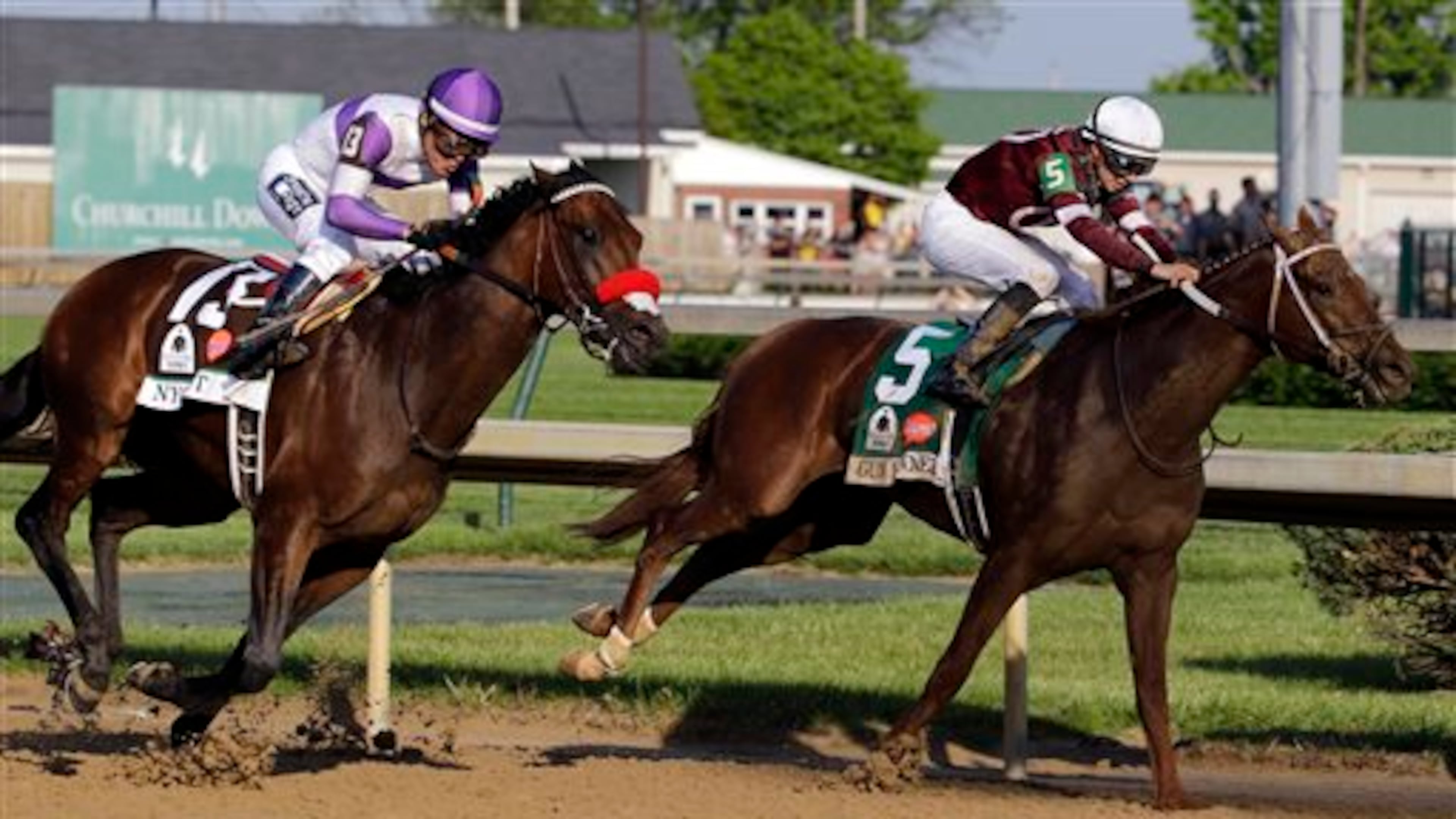 FILE - In this May 7, 2016, file photo, Nyquist, left, ridden by Mario Gutierrez, rides past Gun Runner during the 142nd running of the Kentucky Derby horse race at Churchill Downs in Louisville, Ky. Gun Runner, third-place finisher in the Kentucky Derby, will skip the Preakness, leaving a likely field of 11 for the middle leg of the Triple Crown on Saturday at Pimlico. (AP Photo/Julio Cortez, File)
