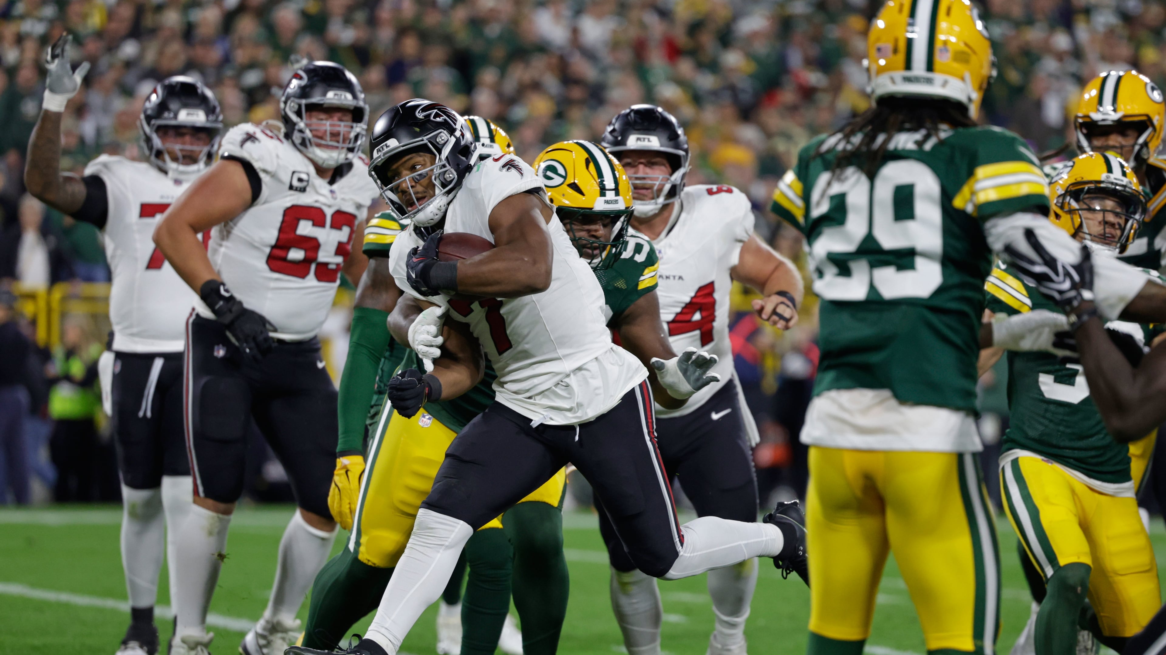 Atlanta Falcons' Bijan Robinson runs for a touchdown during the first half of an NFL football game against the Green Bay Packers in Green Bay, Wis., Thursday, Sept. 24, 2026. (Matt Ludtke/AP)