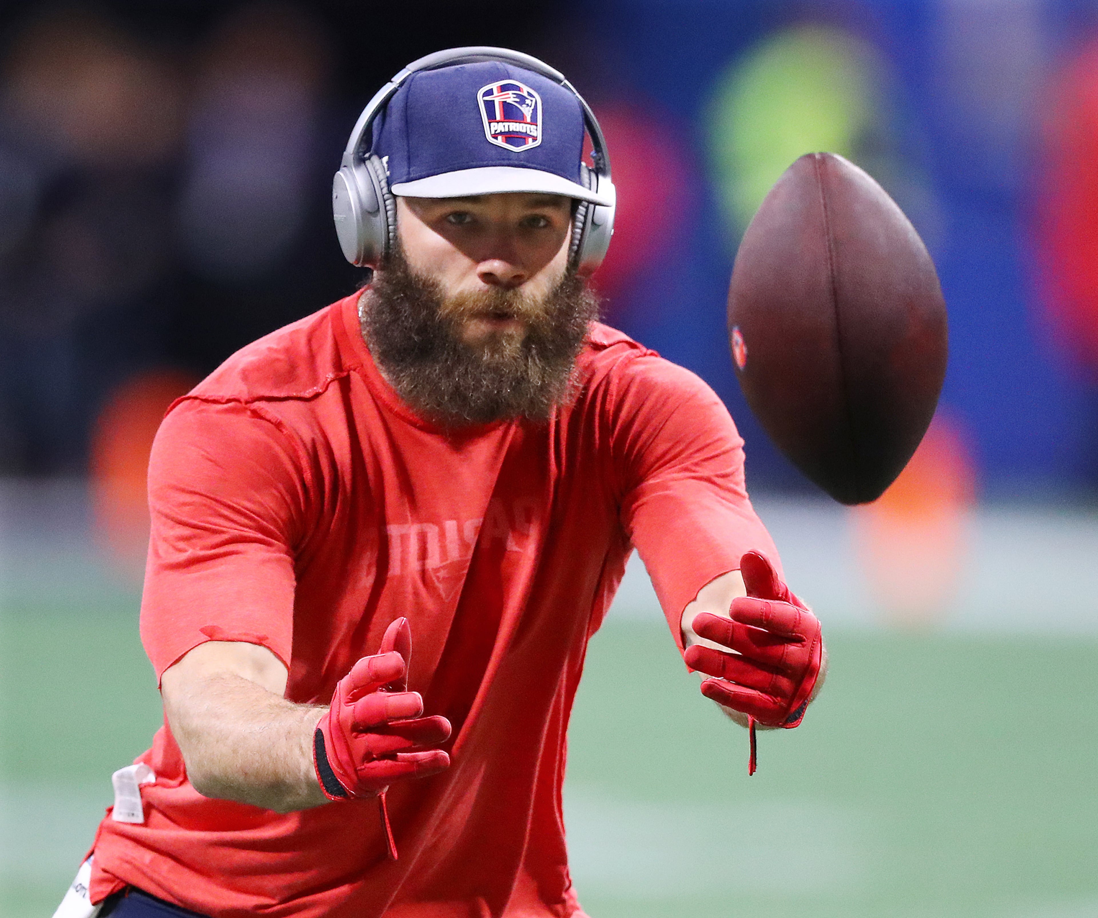 Julian Edelman catches passes while warming up prior to the game. (Curtis Compton/ccompton@ajc.com).