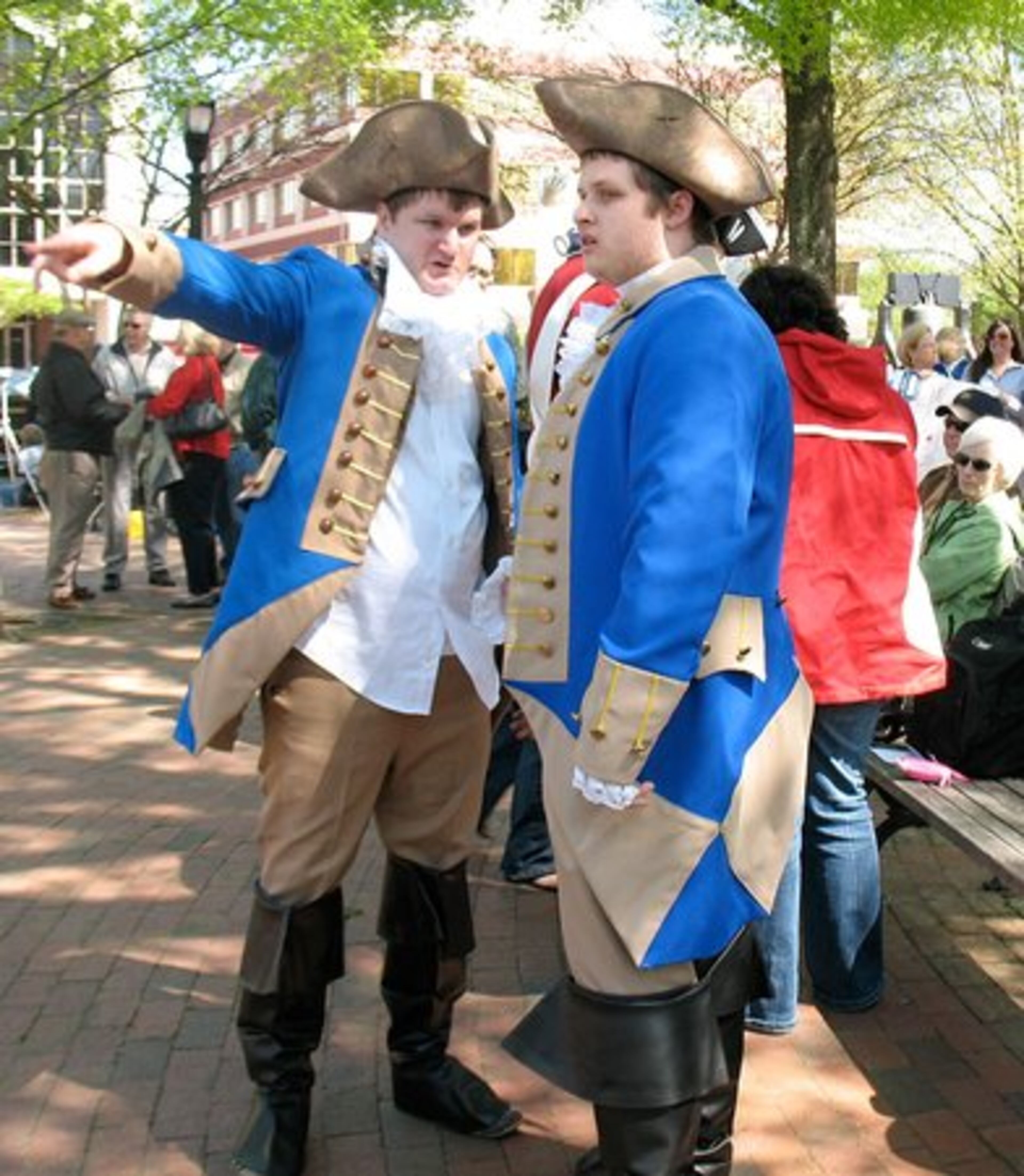 Two men dressed as Minutemen attended the protest in Marietta.