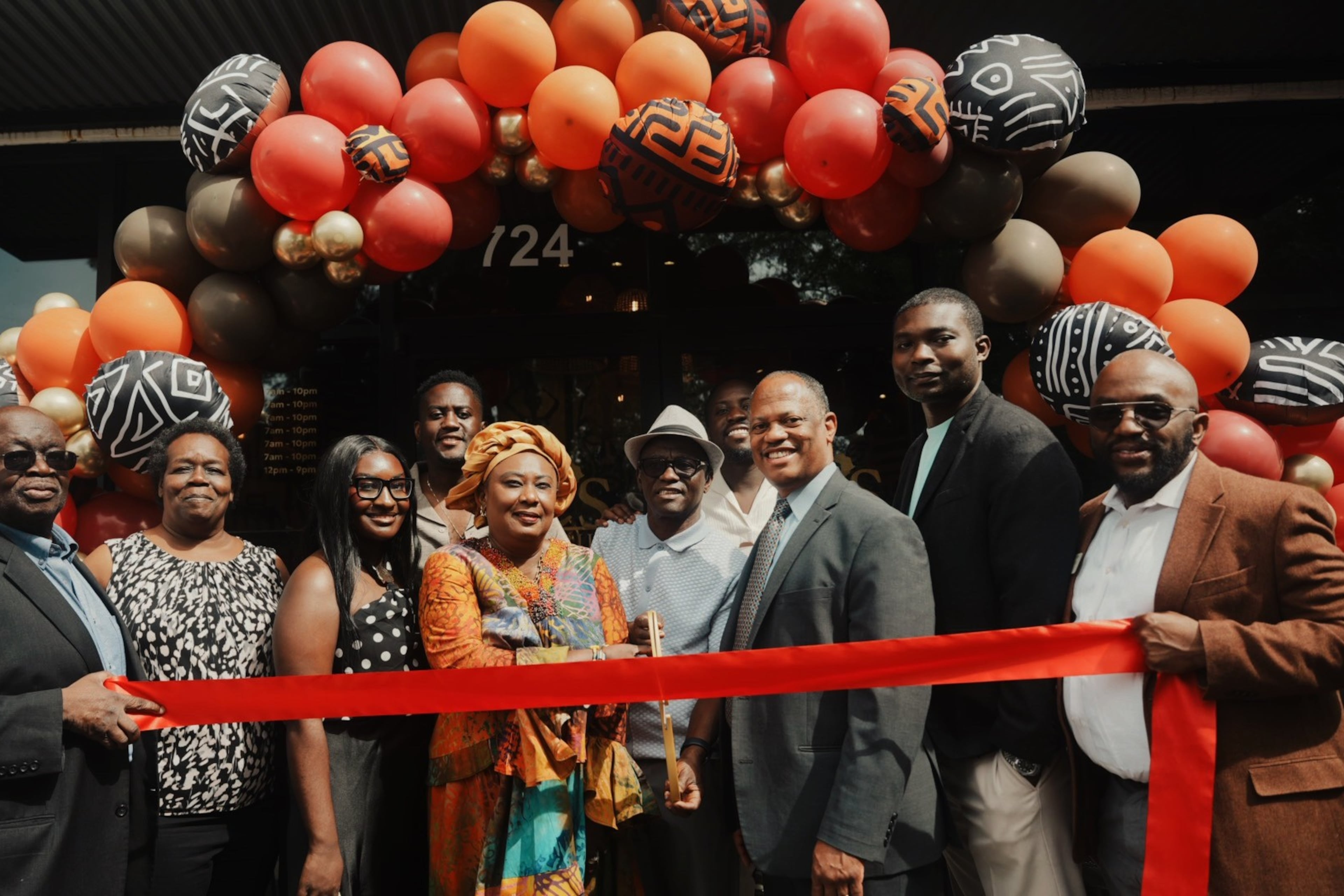 Ike's Cafe & Grill opened its new location in Marietta in May. From left to right: Dr. Richard Druyeh, president of the Ghana Council of Georgia; Cheryl Richardson, Ward 1 councilwoman; Marcelina Kwarteng, founder of Ike’s Cafe & Grill; Mike Kwarteng, founder of Ike’s Cafe & Grill; Ama Serwah, founder of Ike’s Cafe & Grill; Ike Kwarteng, founder of Ike’s Cafe & Grill; Kwab Kwarteng, founder of Cafe Café & Grill; David Wilkerson, state representative for House District 38; Solomon Adesanya, state representative for House District 43; and Segun Adeyina, state representative for House District 110. (Courtesy of Ike's Cafe & Grill)