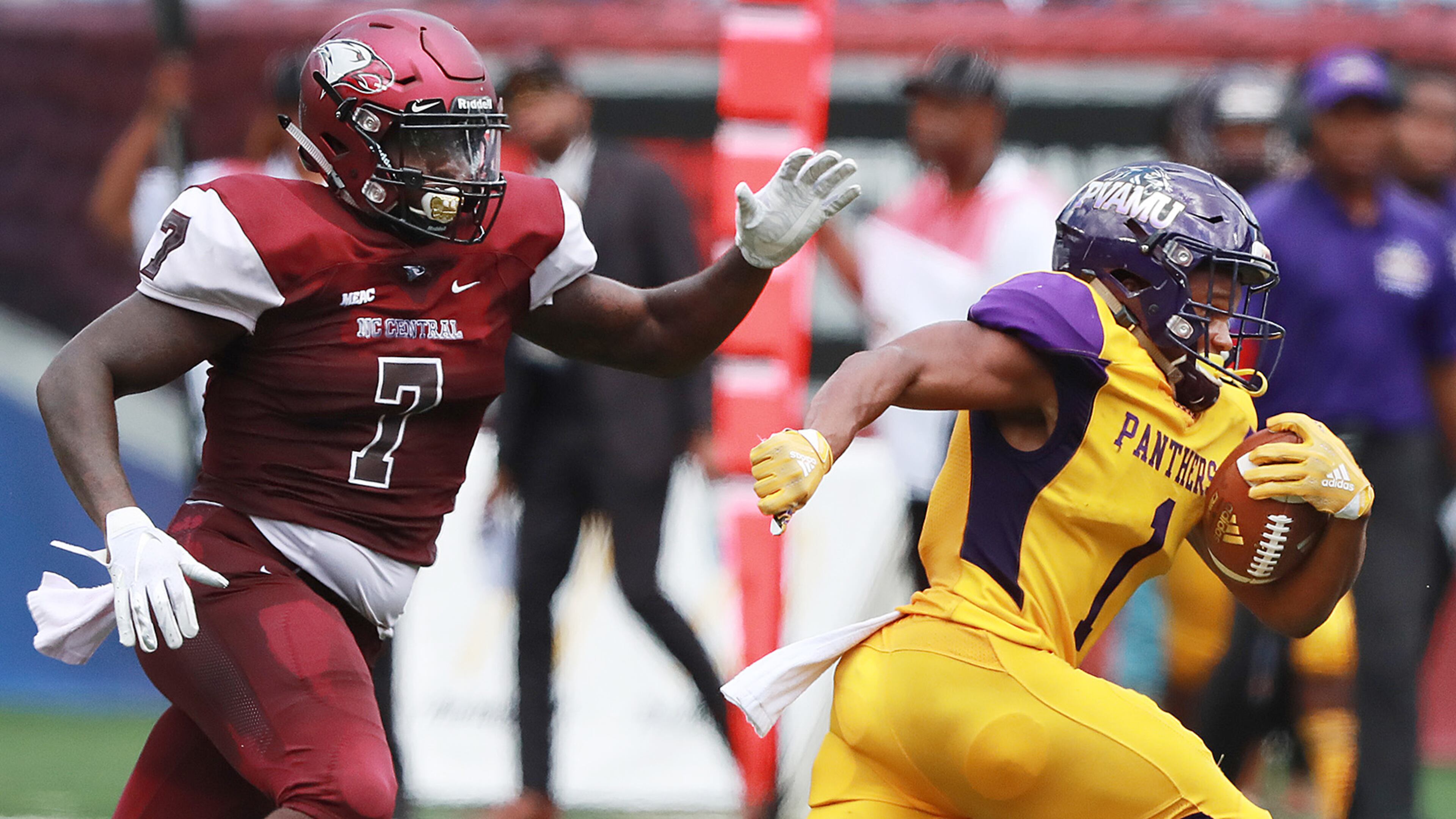 Prairie View A&M running back Dawonya Tucker breaks away from North Carolina Central defender Kawuan Cox during the MEAC-SWAC Challenge Sunday, Sept. 2, 2018, in Atlanta.