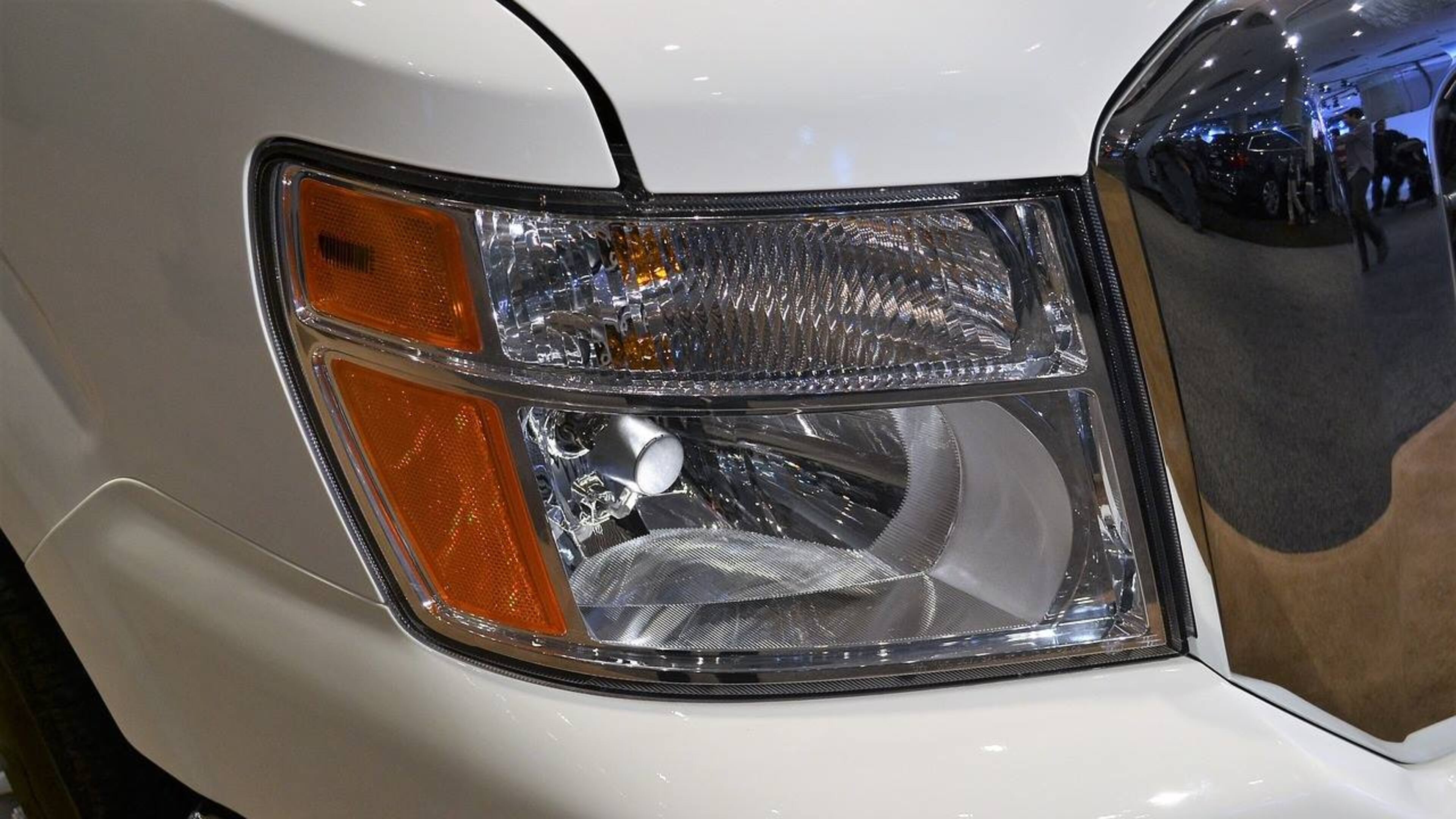 An SUV crashed into a woman's home Wednesday morning, barely missing her and her 1-year-old granddaughter.