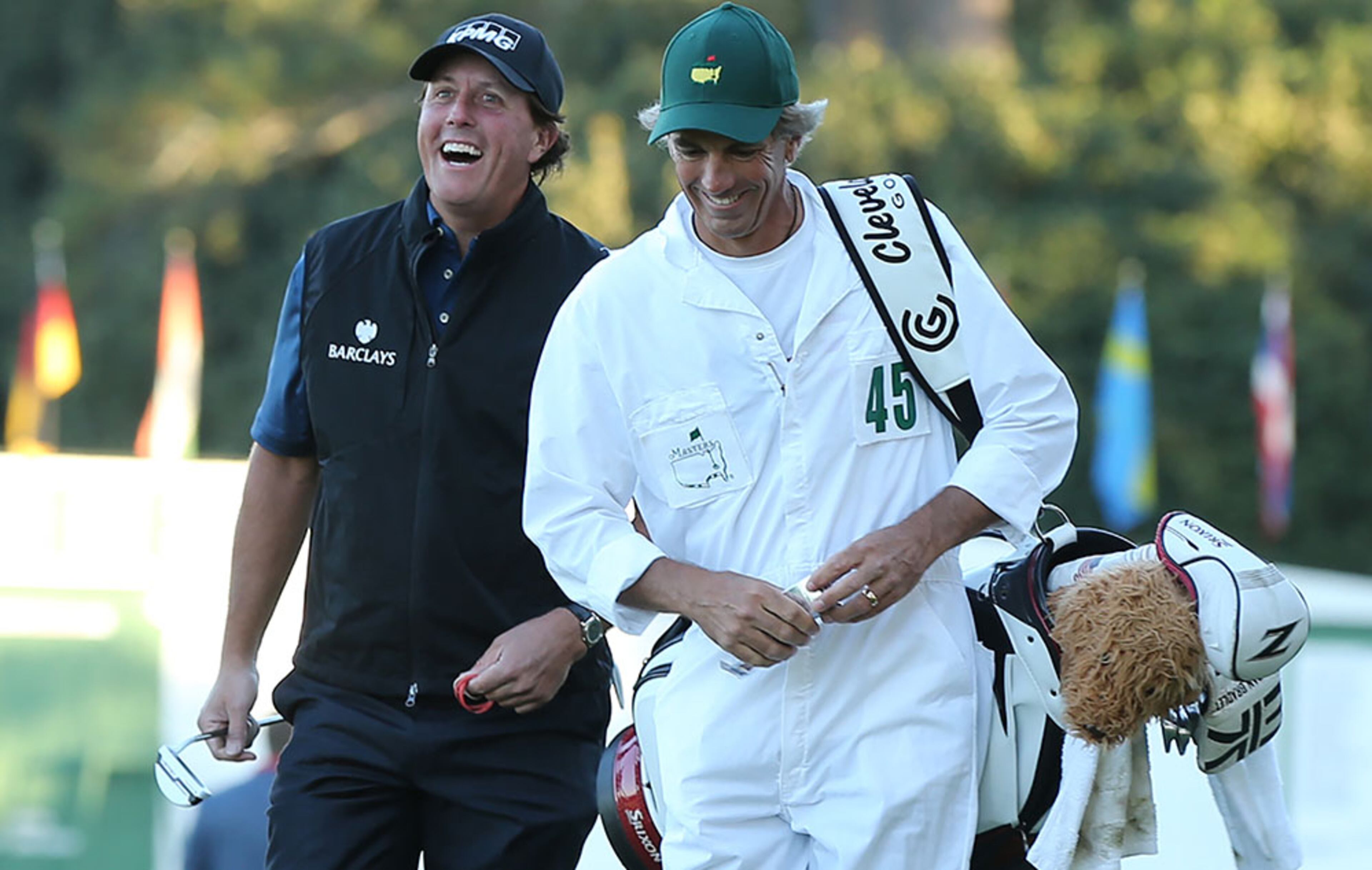 Three-time Masters champion Phil Mickelson is all smiles as he arrives early Tuesday morning for the second day of practice rounds at Augusta National Golf Club on Tuesday, April 5, 2016, in Augusta.
