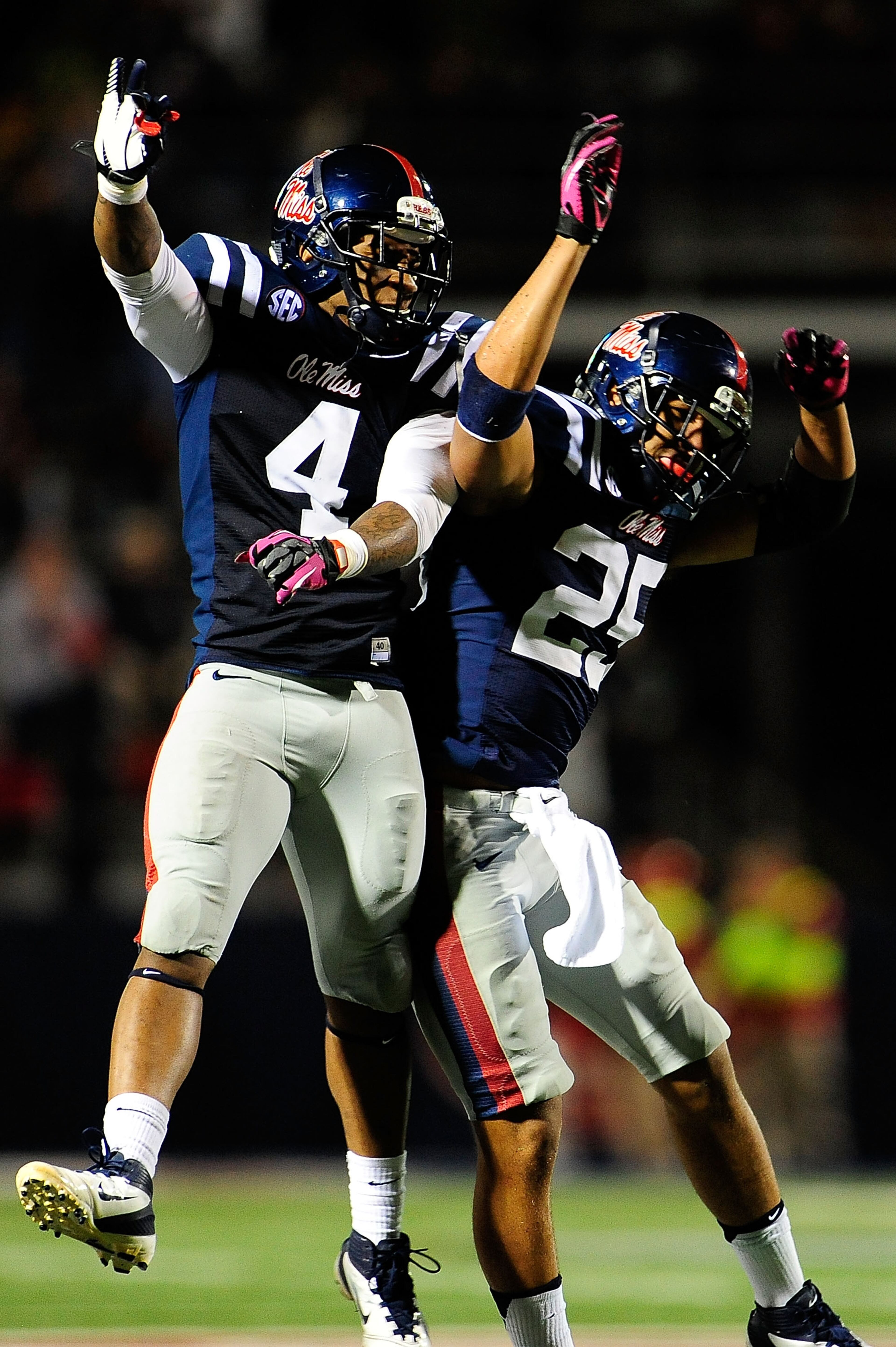 Cody Prewitt (25) and Denzel Nkemdiche (4) of the Ole Miss Rebels celebrate a turnover against the Texas A&M Aggies during a game at Vaught-Hemingway Stadium on October 6, 2012 in Oxford, Mississippi.