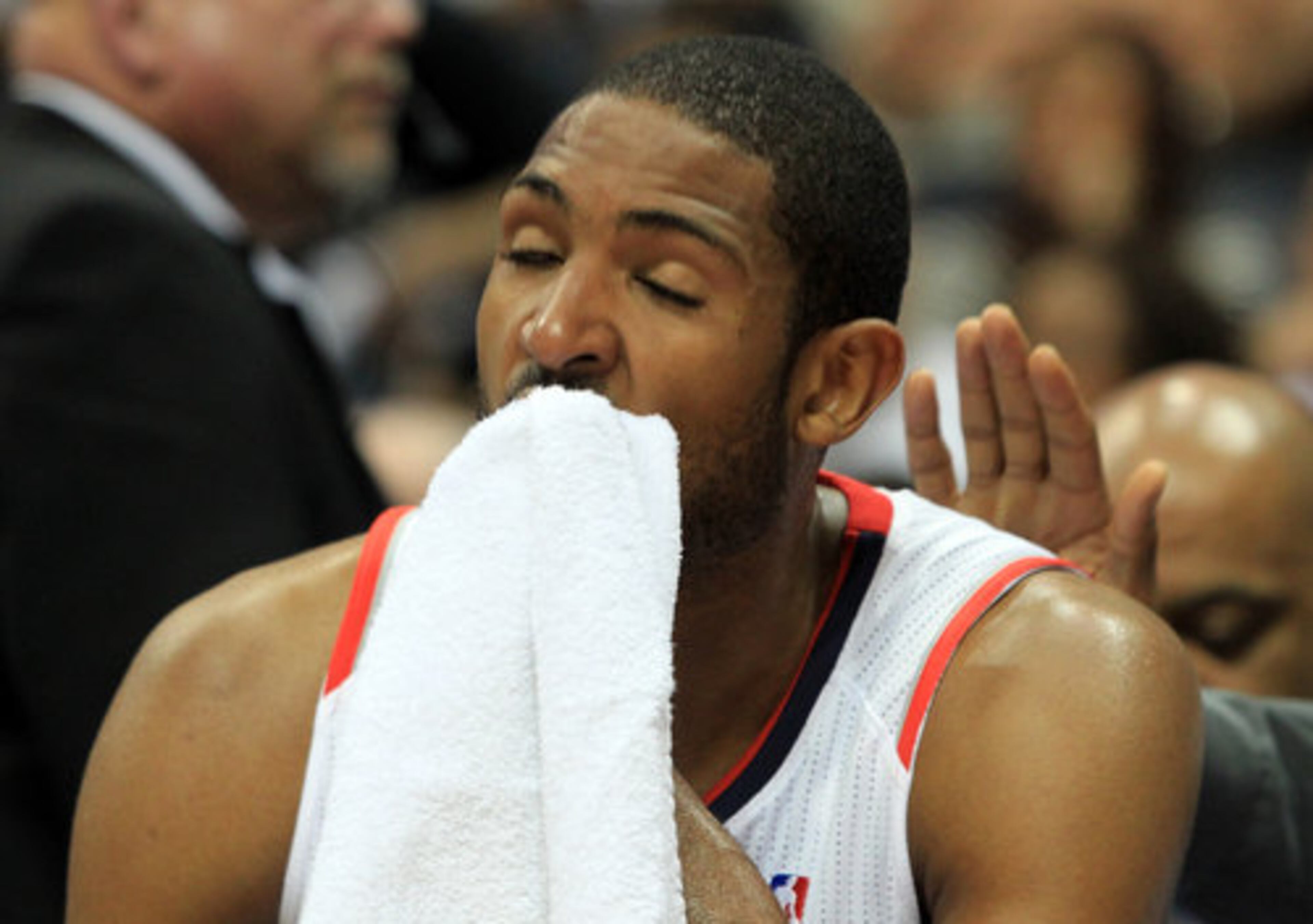 Al Horford watches the final moments of the season-ending loss.