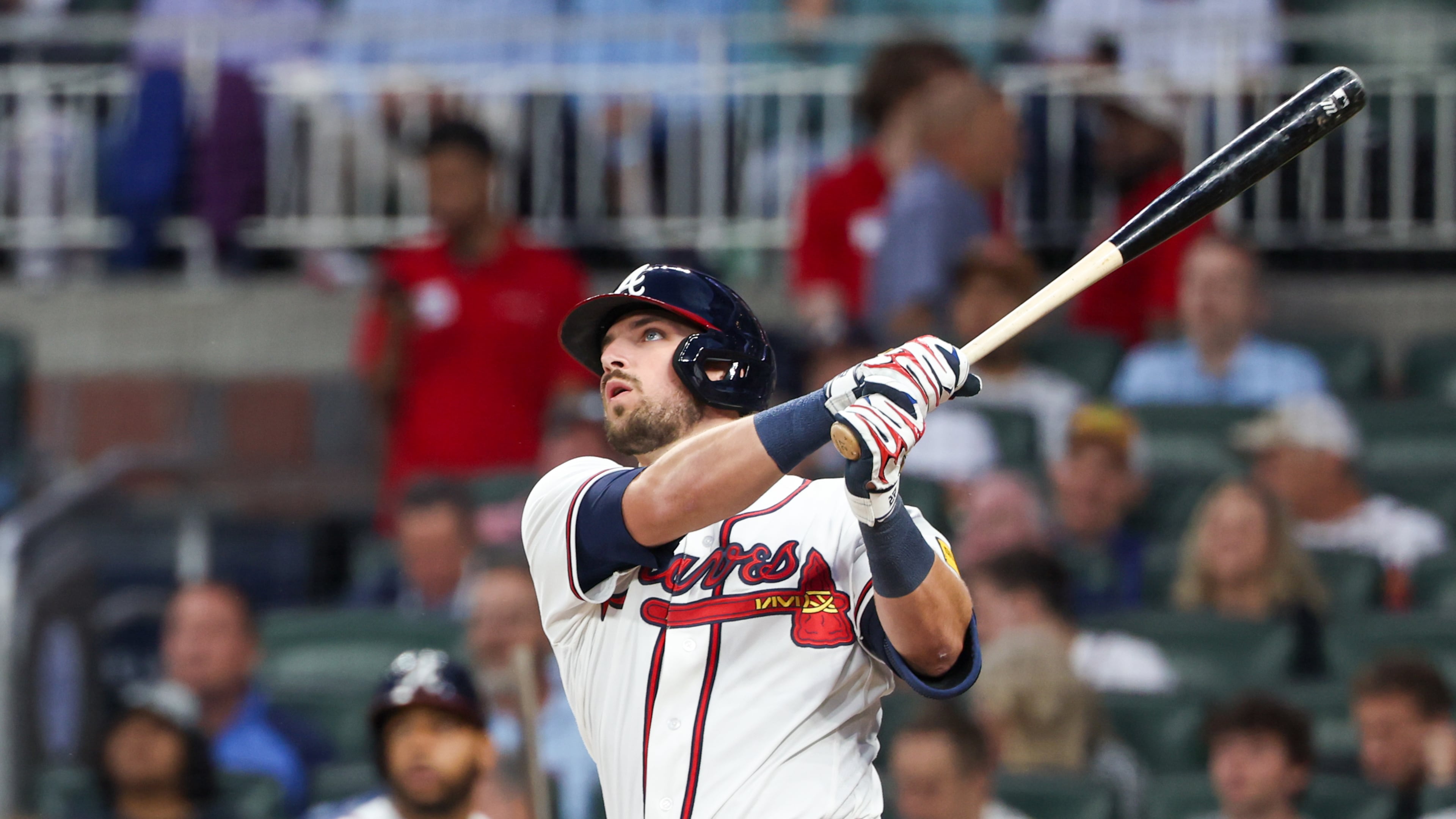 Braves third baseman Austin Riley hits a home run in the fifth inning against the Cubs at Truist Park on May 12, 2026. Correcting a dipping front left shoulder when he bats could improve his performance. (Arvin Temkar/AJC)