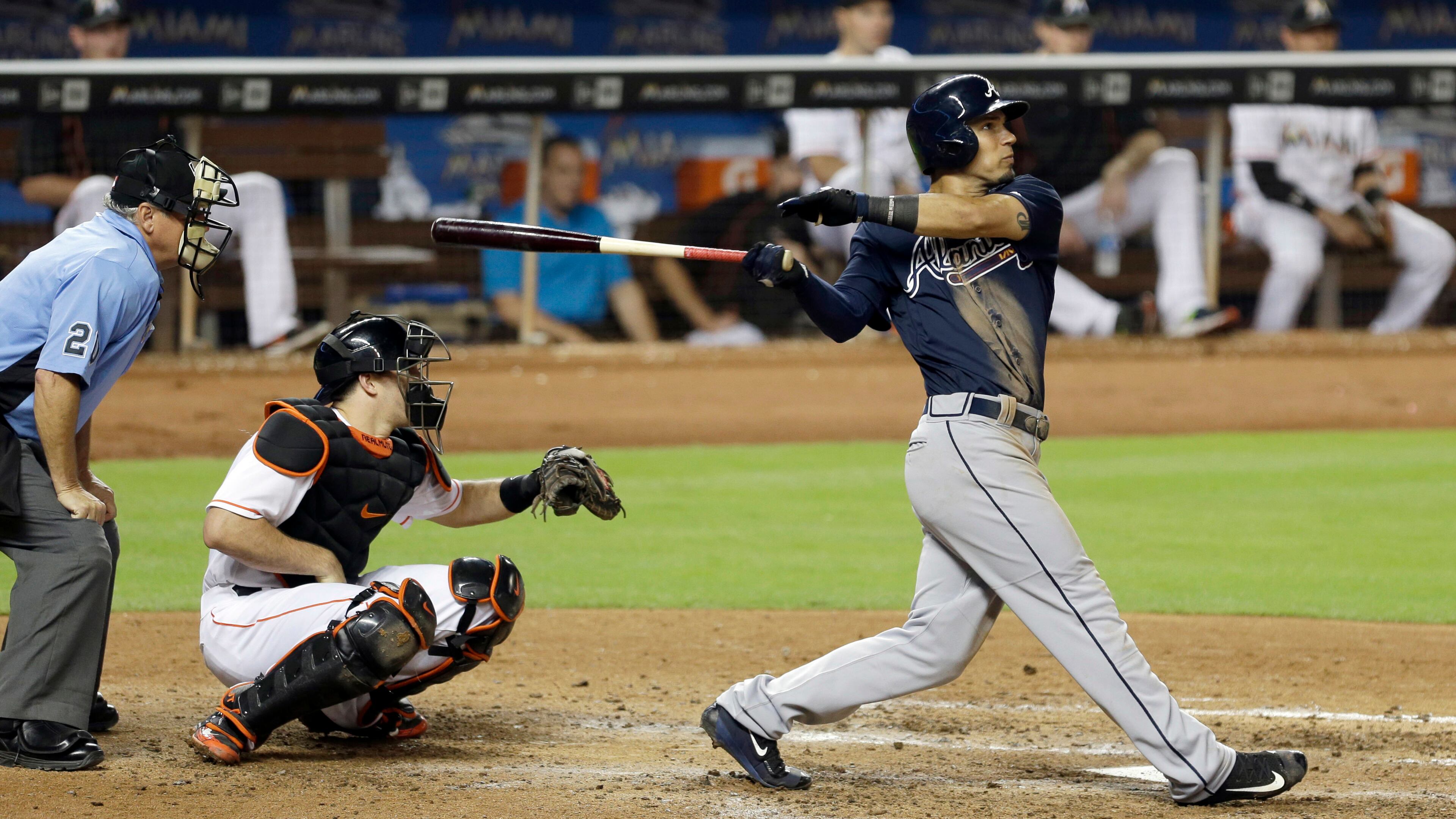 Atlanta Braves' Jace Peterson follows through on his two-run home run against the Miami Marlins in the eighth inning of a baseball game, Tuesday, June 21, 2016, in Miami. Emilio Bonifacio scored on the home runThe Braves won 3-2 in 10 innings. (AP Photo/Alan Diaz)