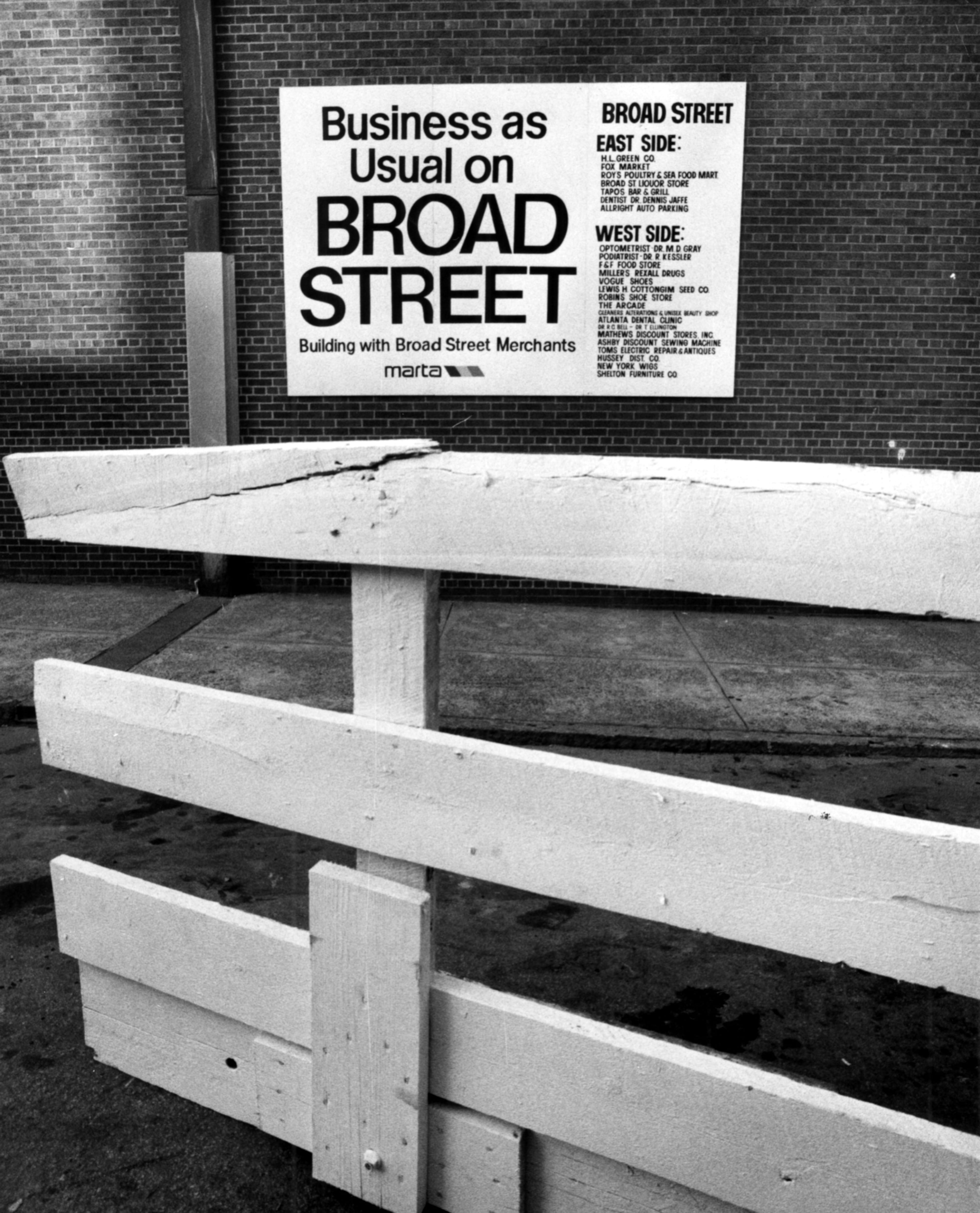 May 25, 1978 -- A MARTA construction sign near the H.L. Green store at MLK and Broad Street promises "Business as usual on Broad Street." Broad Street businesses were seriously impacted by MARTA construction.