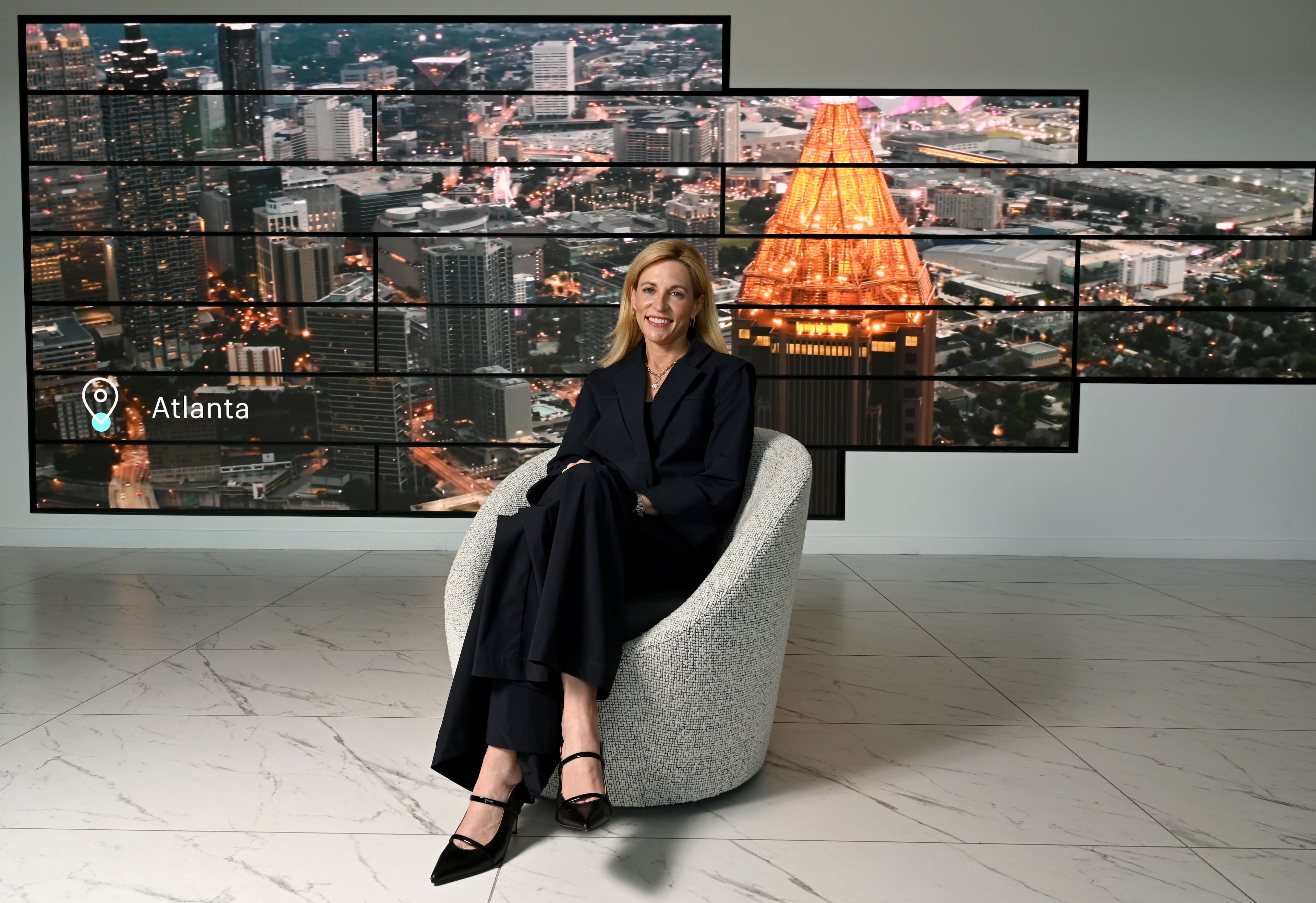Allison Dukes, senior managing director and chief financial officer of Invesco, said of maintaining a work-life balance: "… You do have to re-evaluate your circumstances periodically, regularly, and make sure you’re satisfying the needs of both your career, but also your personal life and your family." (Hyosub Shin/AJC)