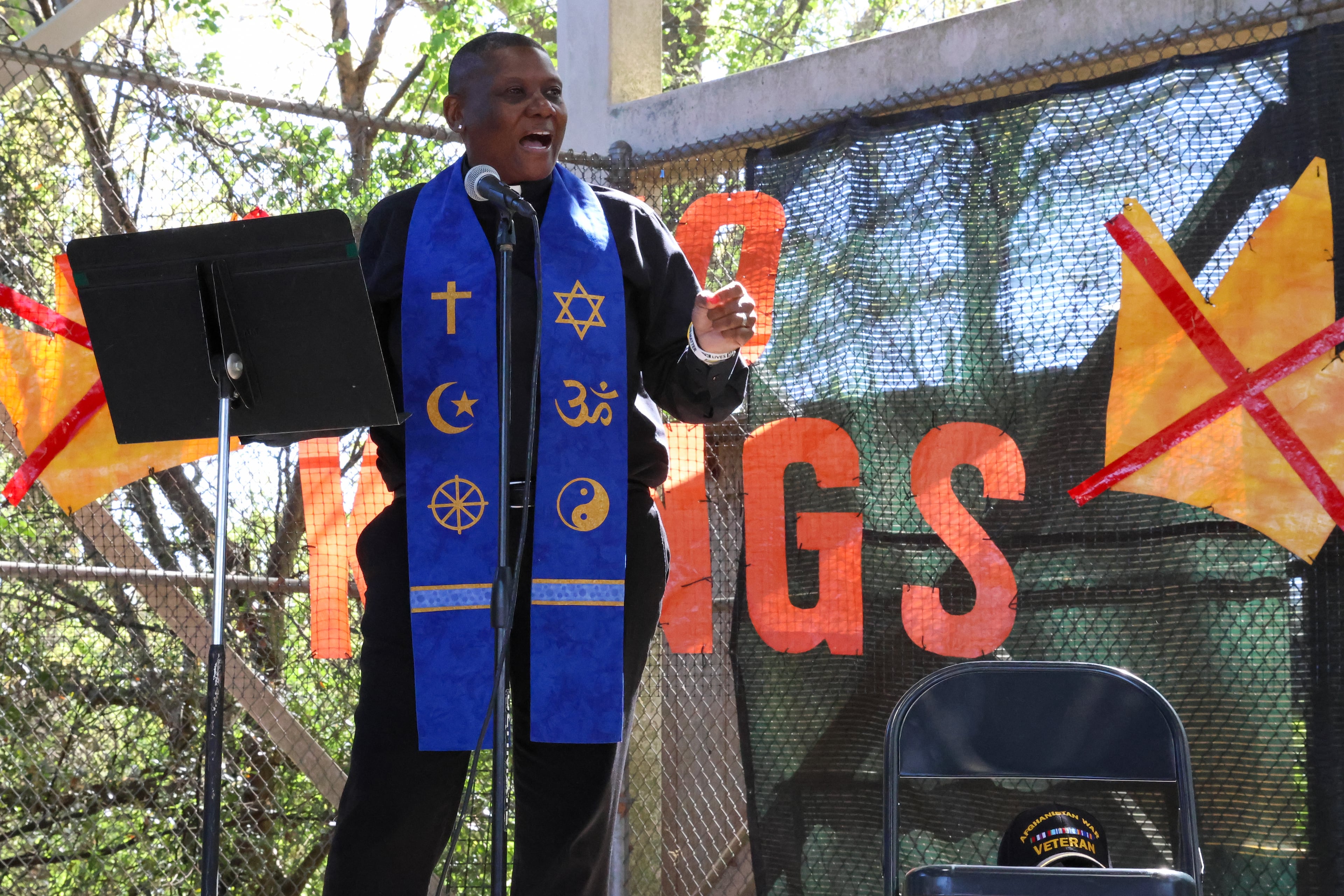 Chaplain Cole Knapper, a U.S. Army veteran who served in Afghanistan, speaks at a rally at Bishop Park in Athens on Saturday, March 28, 2026. Protesters gathered in 10 different locations around Georgia’s Congressional District 10, leading up to a “Democracy Fair” at Bishop Park as part of a nationwide day of “No Kings” demonstrations. Organizers estimate that a few thousand people participated, many of them first-time protesters. (C.J. Bartunek for the AJC)