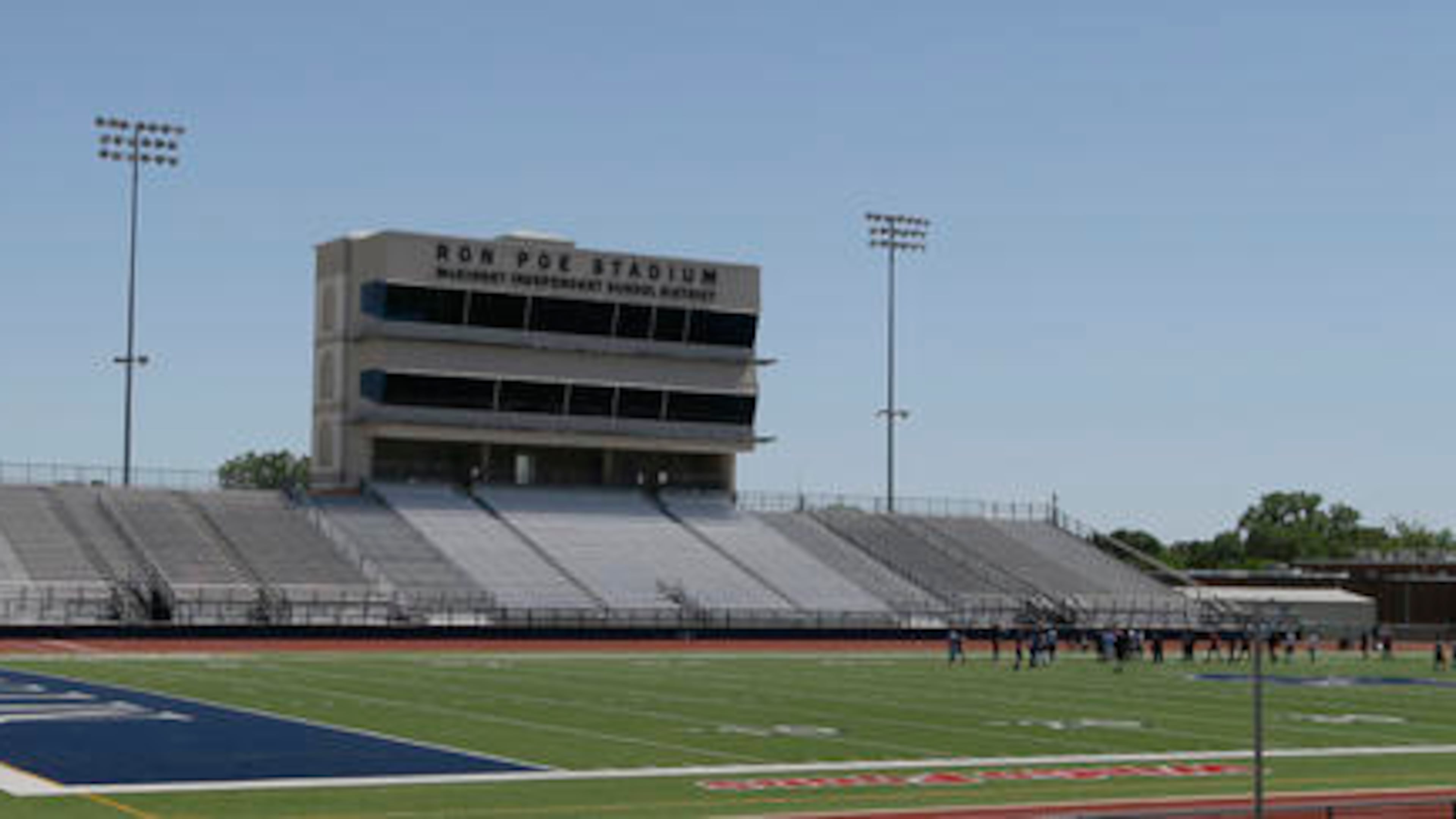 FILE - In this April 28, 2016, file photo, middle schoolers use the field in Ron Poe Stadium in McKinney, Texas. Voters in McKinney Independent School District approved a bond issue Saturday, May 7, 2016, to build a new high school football stadium. (AP Photo/LM Otero, File)