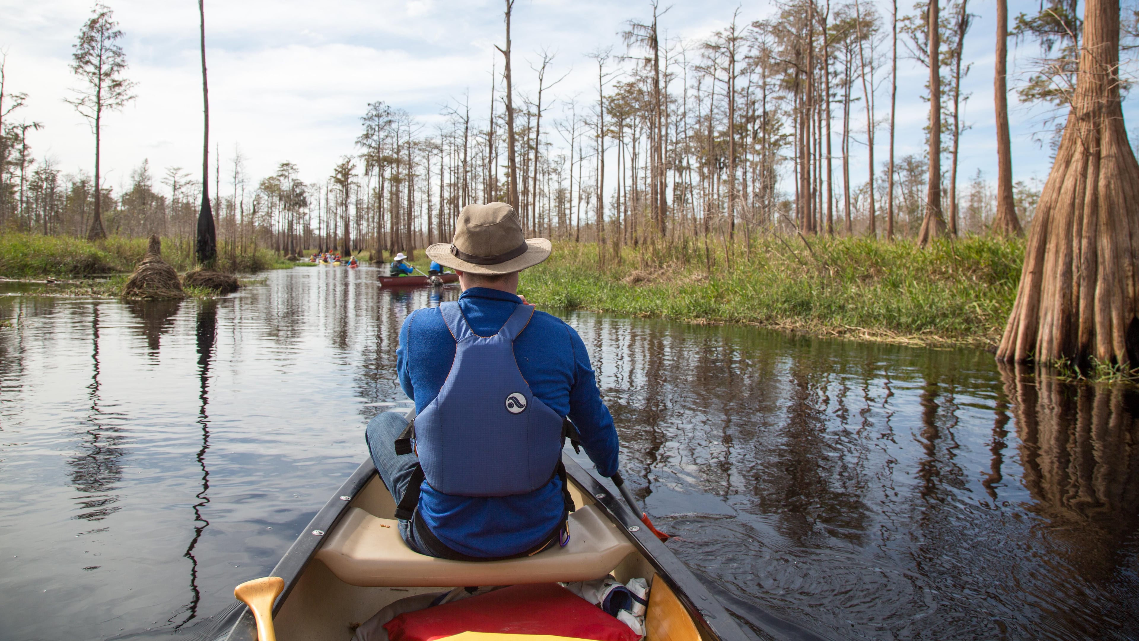 A paddler in a canoe is shown in Georgia's Okefenokee swamp. (Photo Courtesy of Georgia Conservancy)