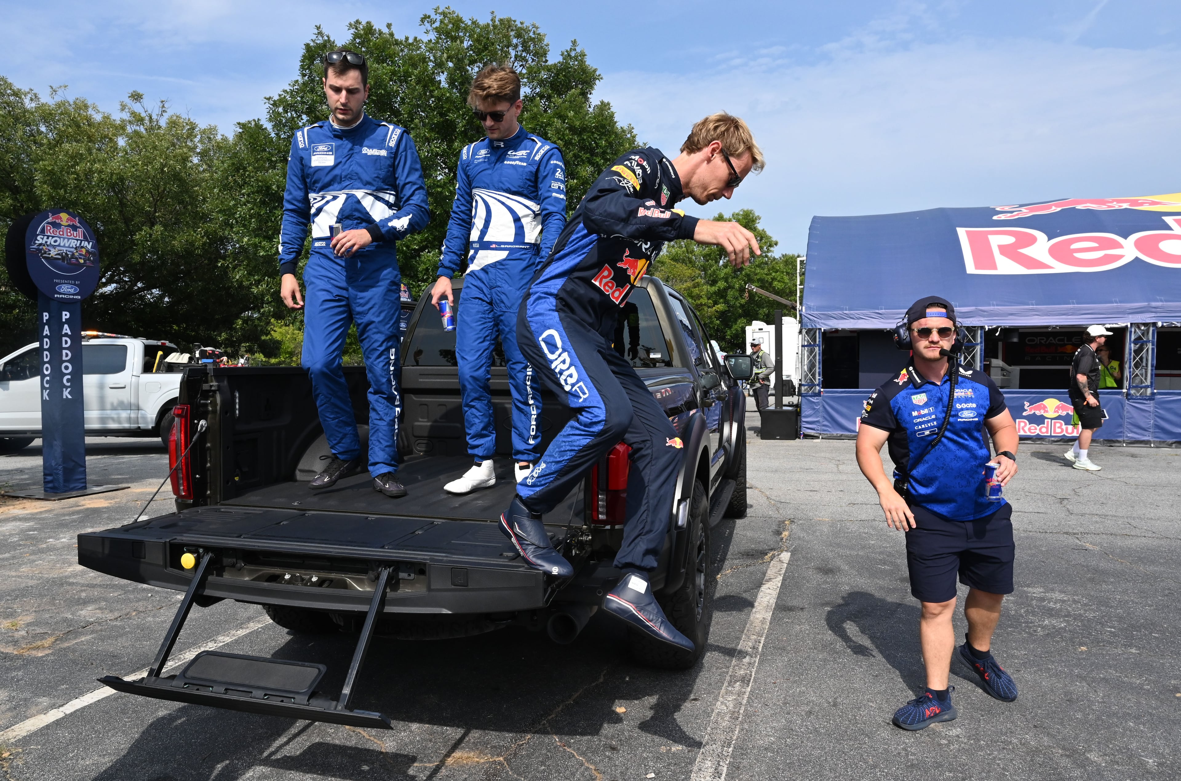Drivers gets off after they participated in a parade during the Red Bull Showrun Atlanta Presented by Ford Racing on Saturday, Aug. 1, 2026, in Atlanta. Atlanta city officials this week approved permits for the Red Bull Showrun that will allow the live motorsports demonstration event to go on as advertised along a roughly half-mile stretch of Hank Aaron Drive — a backup location after earlier plans to hold the event near Piedmont Park ran into opposition from Midtown residents. (Hyosub Shin/AJC)