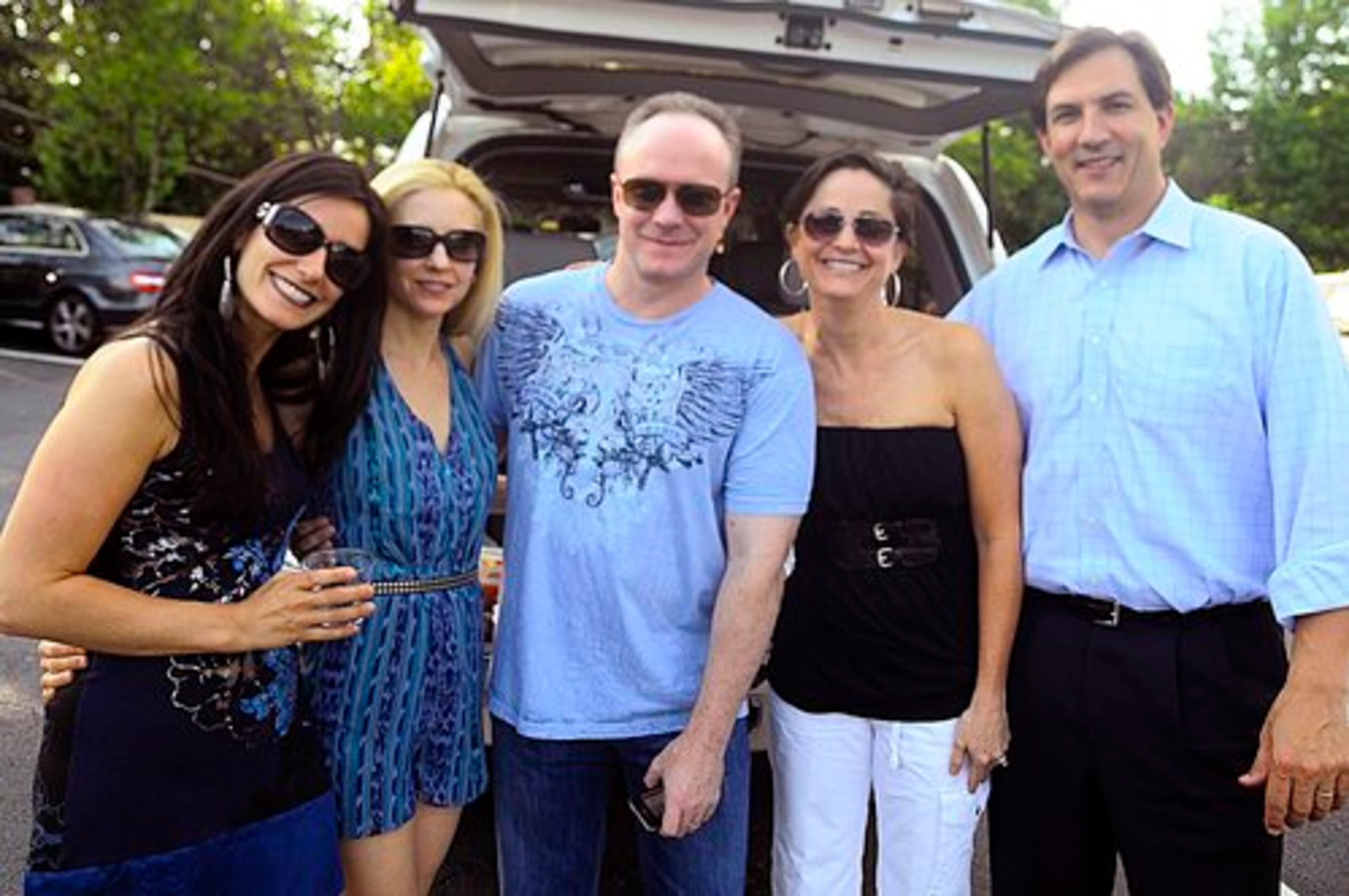 Stephanie Morrow (from left), Heather Buffington, Mark Buffington, Christy Johnson and Andrew Somoza do a little tailgating before the show.