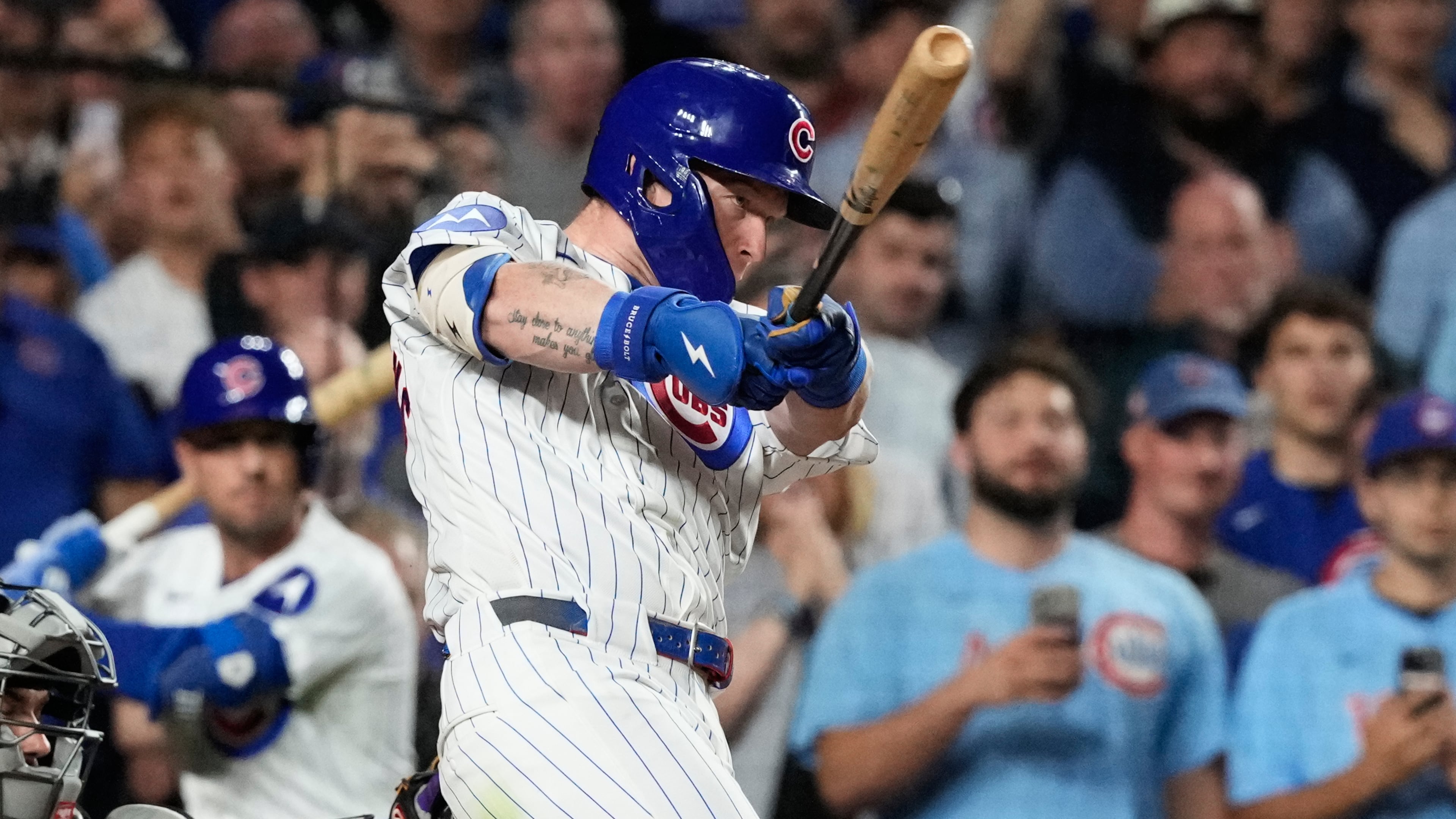 Chicago Cubs' Pete Crow-Armstrong hits a single to complete the cycle during the seventh inning of a baseball game against the Colorado Rockies in Chicago, Monday, June 15, 2026. (AP Photo/Nam Y. Huh)
