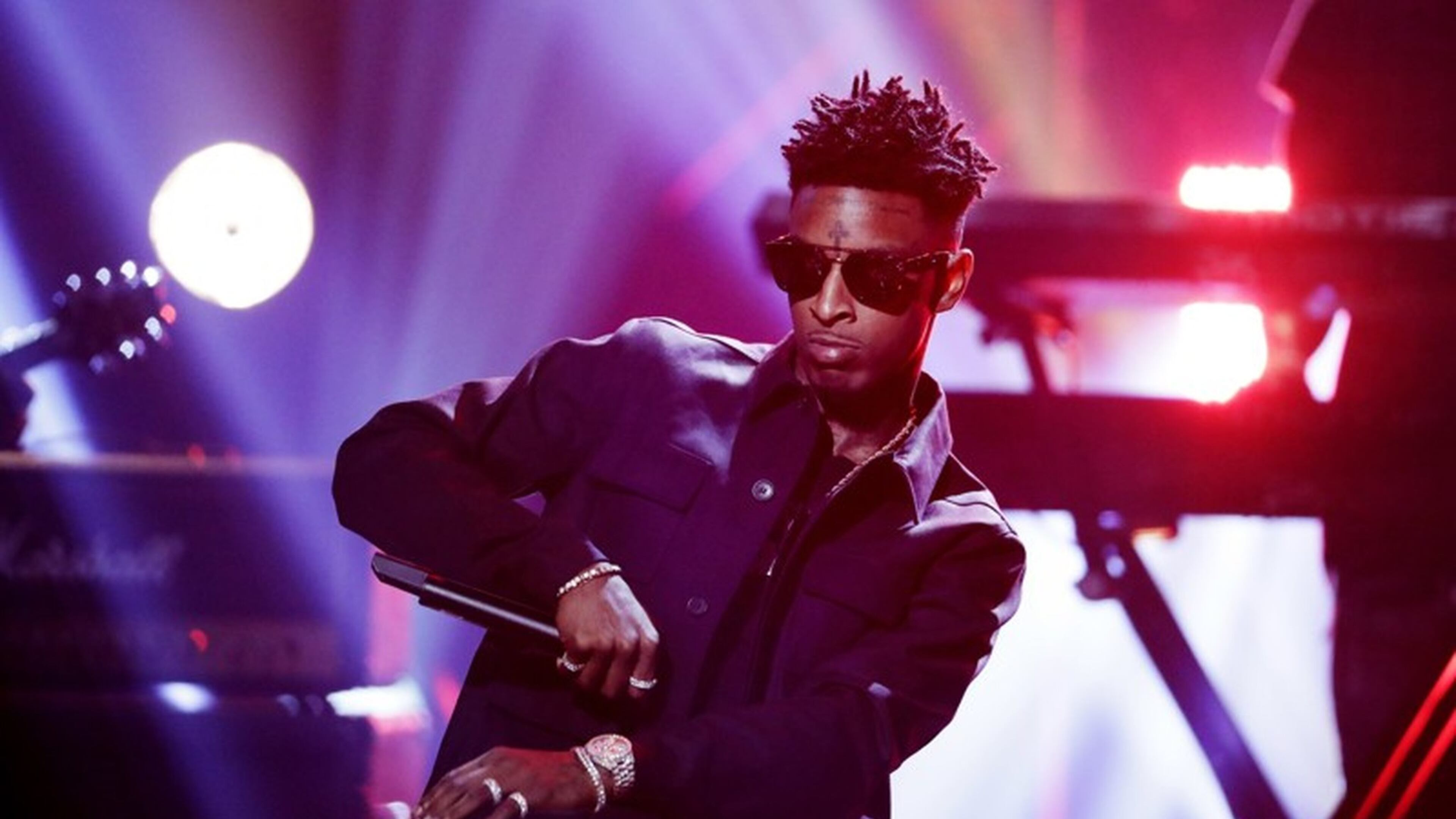 Atlanta rapper 21 Savage will serve food to members of the community on Tuesday.