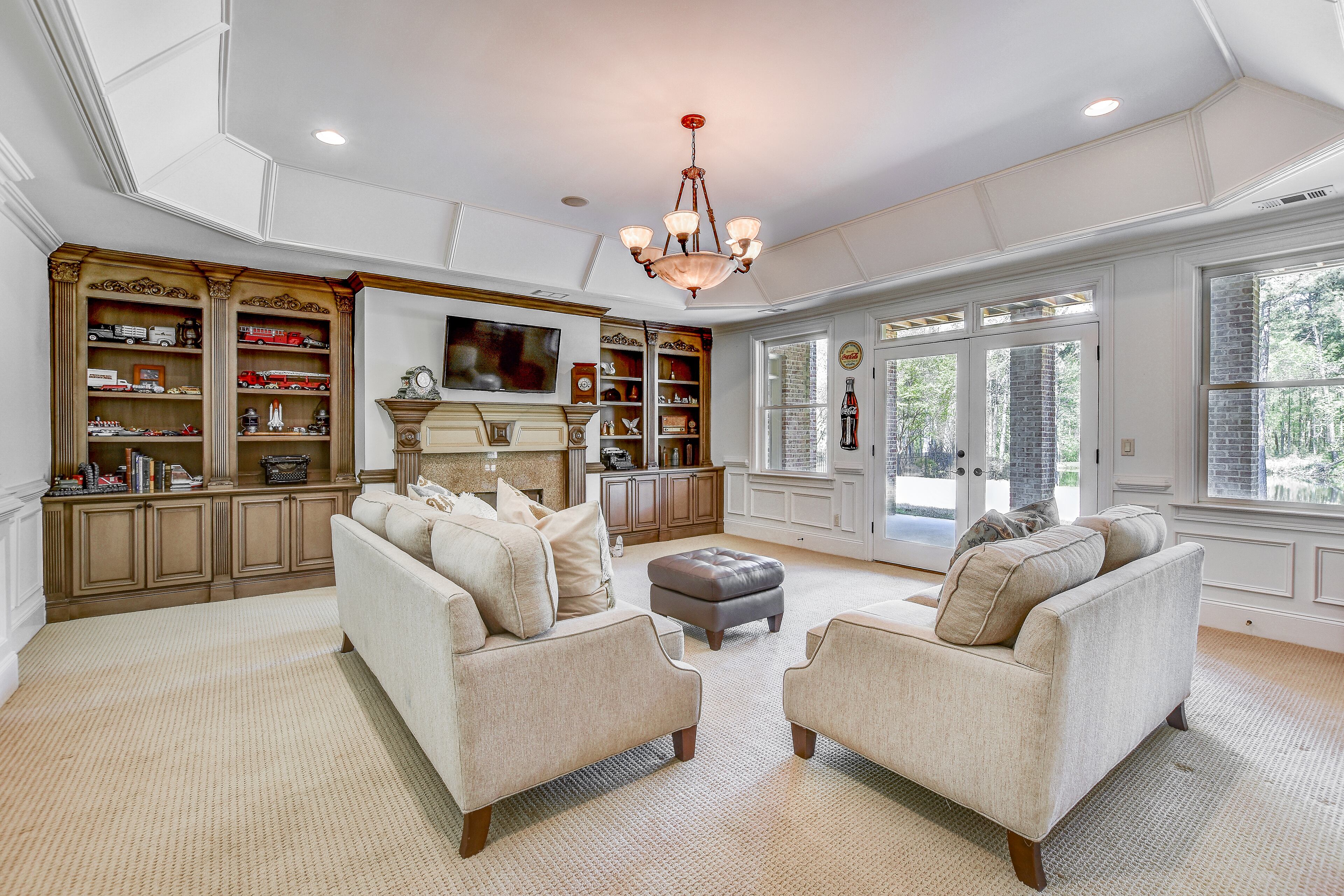 Downstairs family room with ground floor access to backyard. Text by Christela Becker