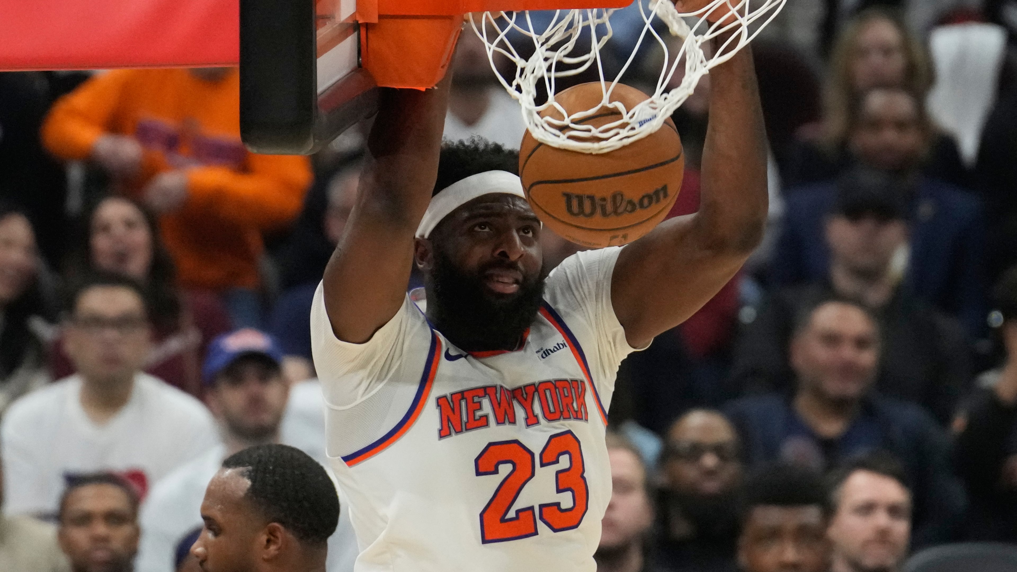 New York Knicks center Mitchell Robinson dunks during the second half of Game 4 in the Eastern Conference finals NBA basketball playoffs series against the Cleveland Cavaliers in Cleveland, Monday, May 25, 2026. (AP Photo/Sue Ogrocki)