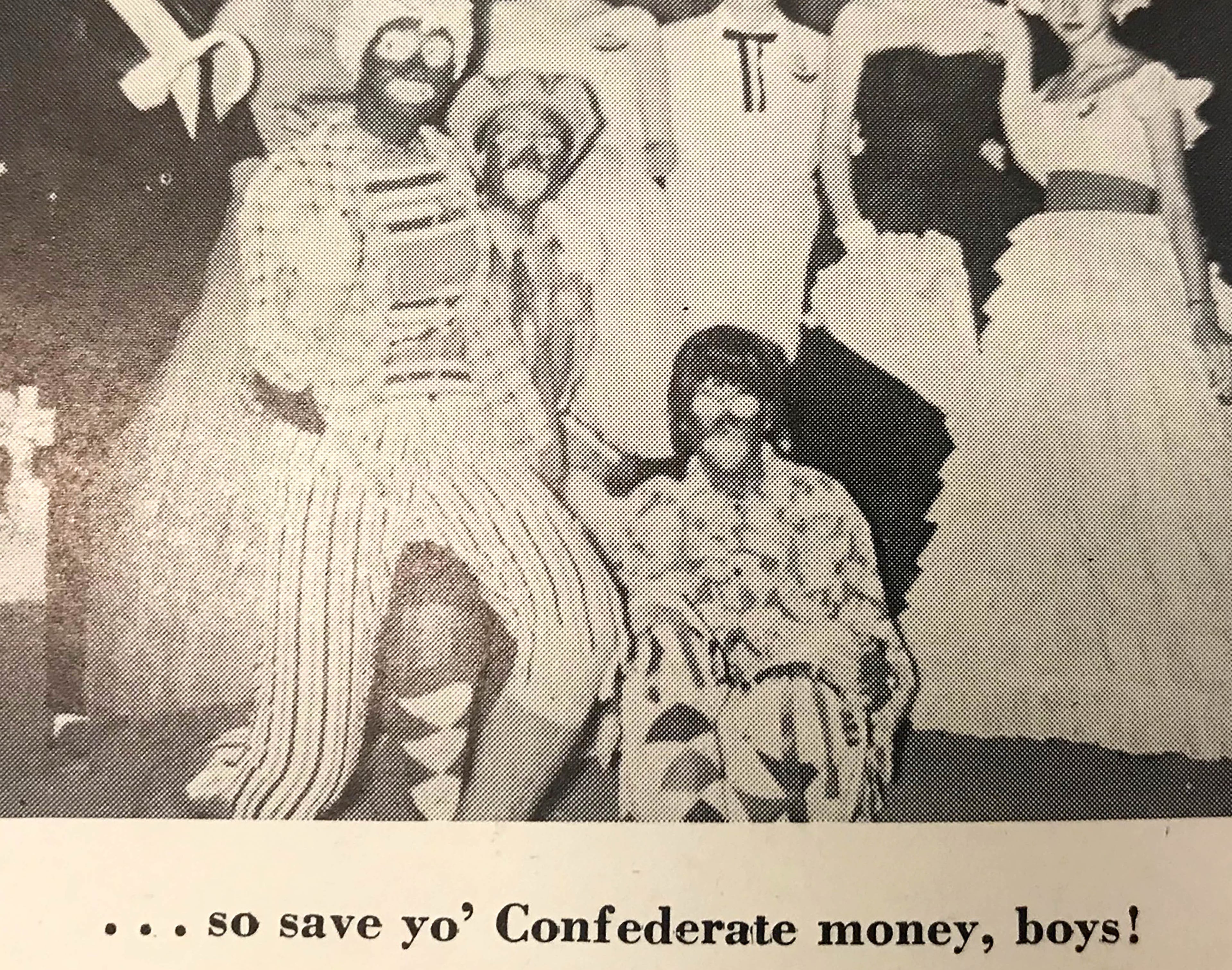 The 1958 yearbook of The University of Georgia shows a second photo of students in blackface with the caption "... so save yo' Confederate money, boys!"