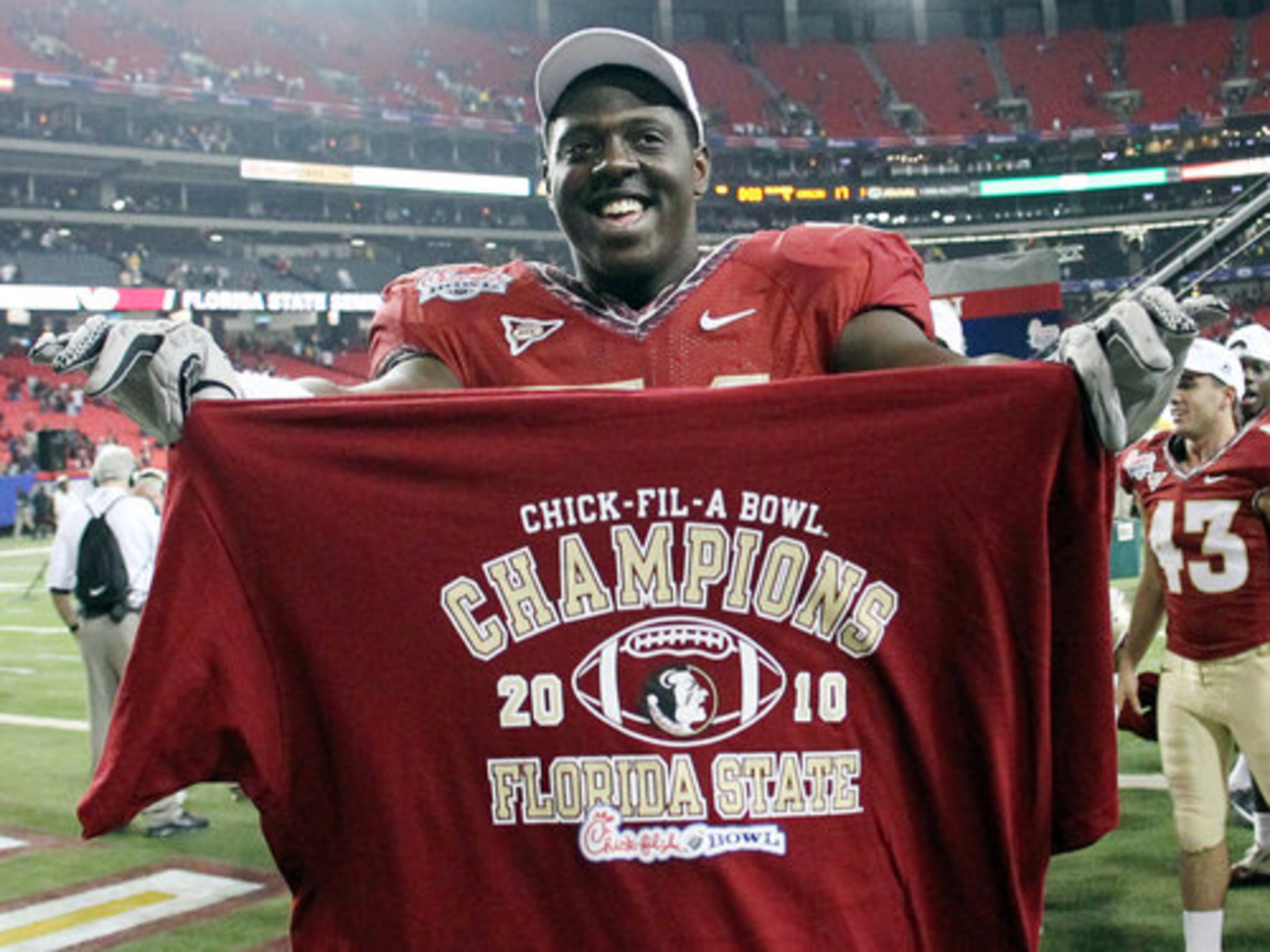 Florida State Seminoles defensive tackle Cameron Erving celebrates winning the Chick-fil-A Bowl 26-17 over the South Carolina Gamecocks at the Georgia Dome in Atlanta on Friday, Dec. 31, 2010.