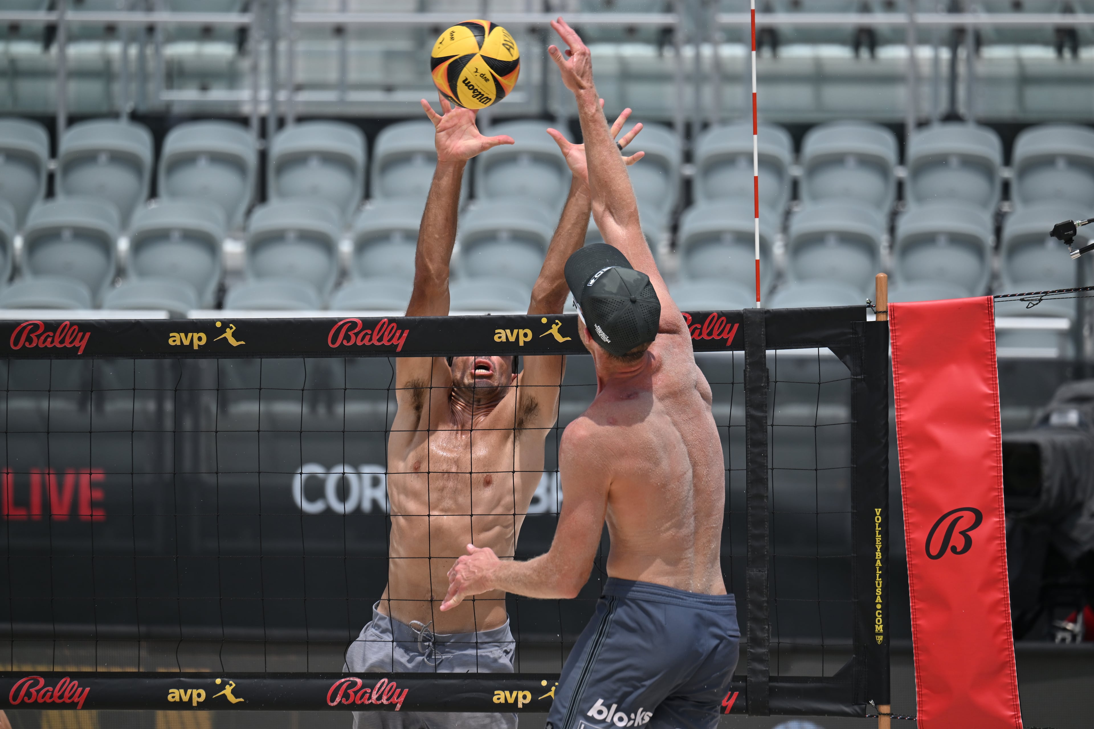 Players compete in the AVP’s Beach Volleyball Gold Series Atlanta Open at Atlantic Station Friday. The AVP is the Association of Volleyball Professionals. (Hyosub Shin / Hyosub.Shin@ajc.com)