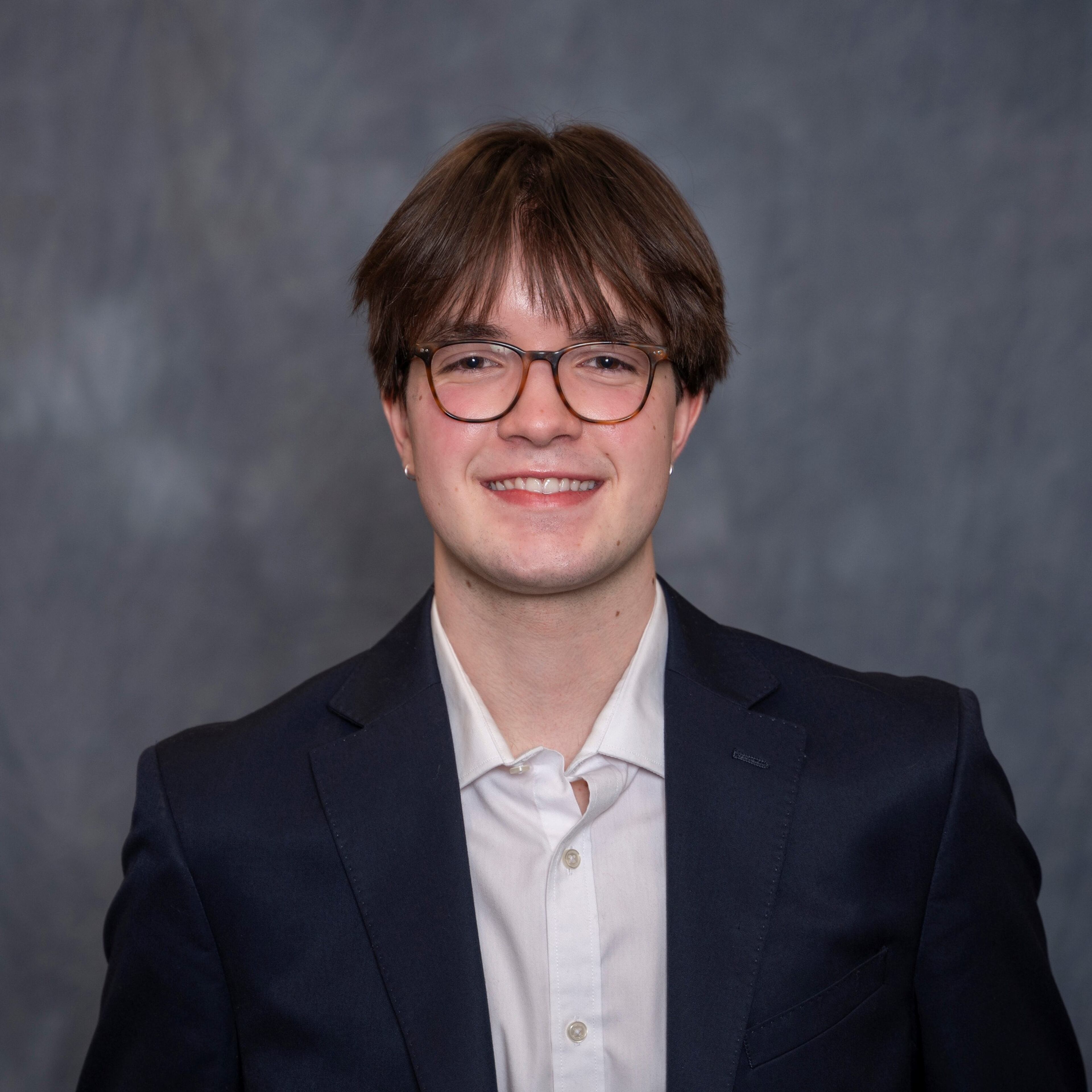 Ellis Schroeder is the 2025 valedictorian of Druid Hills High School in DeKalb County. Schroeder plans to study global health and art history at Yale University. “The volatility of democracy and justice — the systems intended to support independent and communal growth seem to fracture. I can worry all I want about my personal life, but systemic and administrative conflict impedes connection while increasingly polarizing our world at micro and macro scales." (Handout)