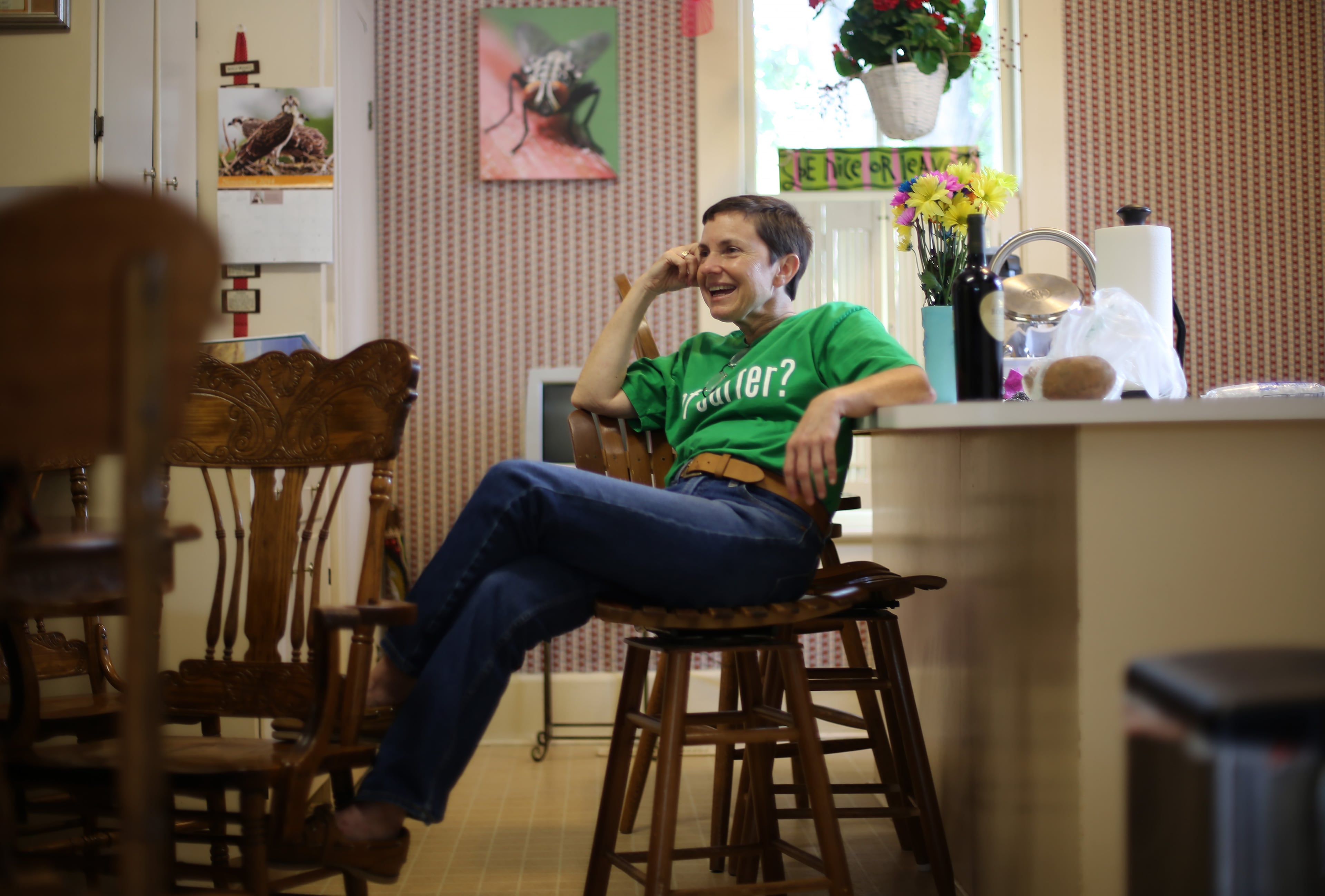 Jill Stuckey, a close personal friend of the Carters, laughs while telling stories in the kitchen of her Plains home, where the Carters often hang out on weekends.