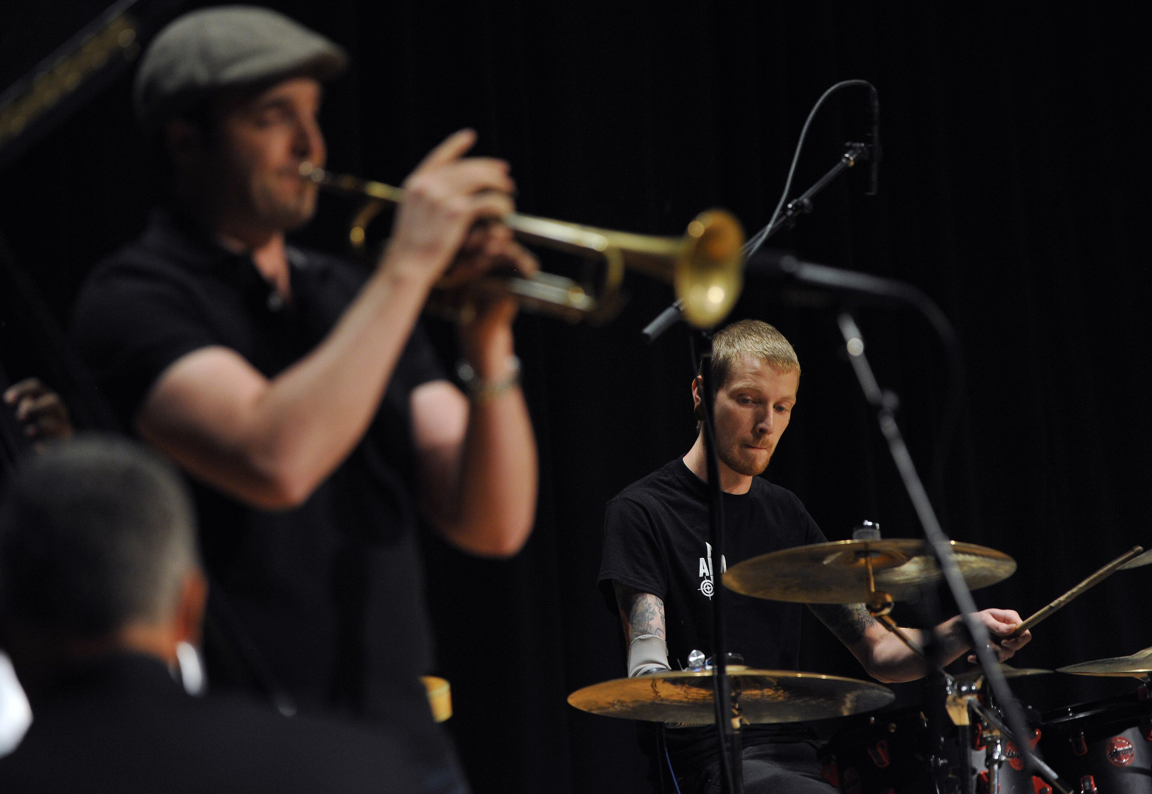 Aspiring musician Jason Barnes, a drummer who lost his right hand in an accident, plays with a jazz band during a Kennesaw State University concert on Saturday March 21, 2014 in Kennesaw, Ga. David Tulis / AJC Special