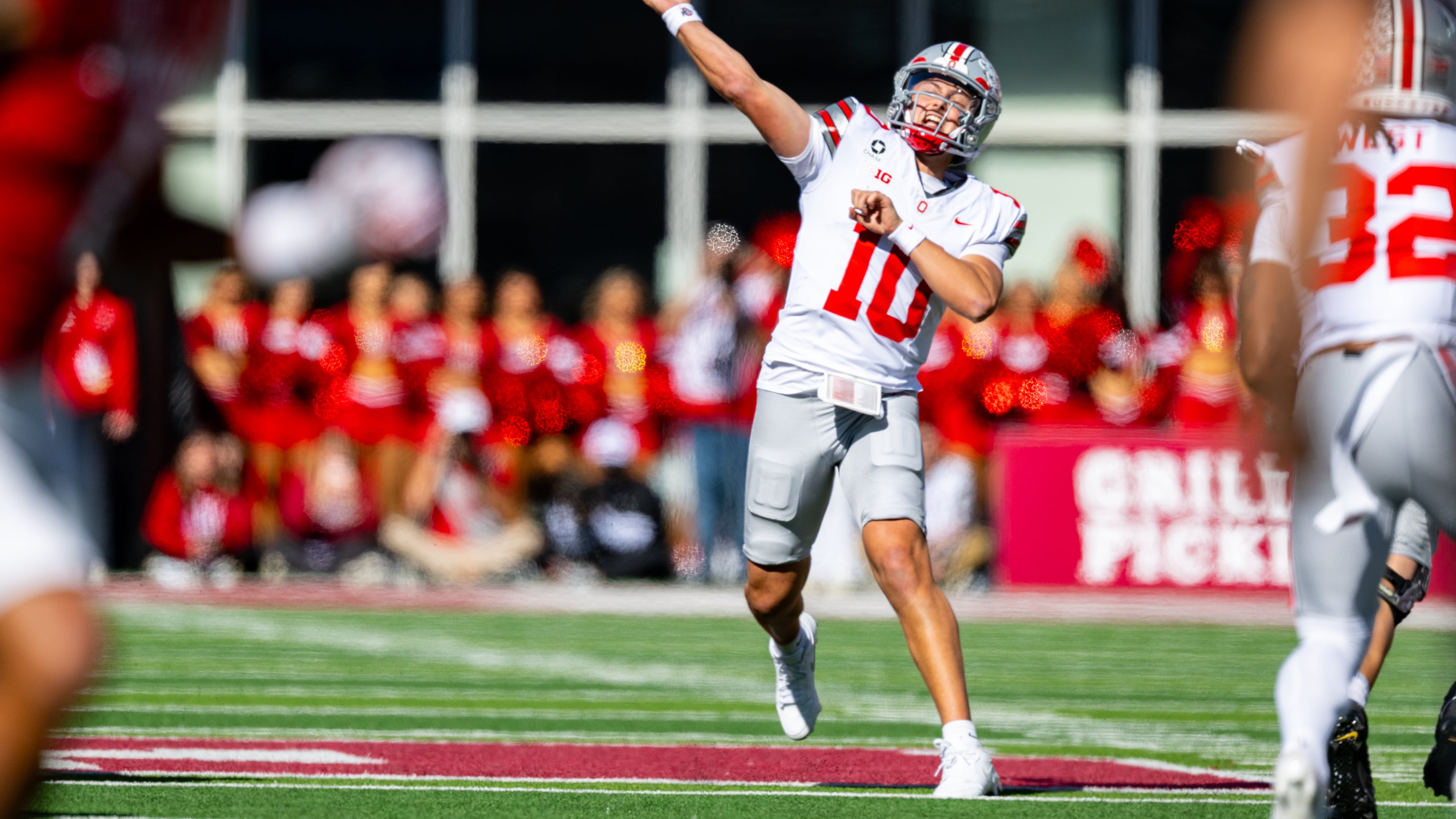 Ohio State quarterback Julian Sayin (10) makes a pass deep upfield during the second half of an NCAA college football game against Indiana, Saturday, Oct. 17, 2026, in Bloomington, Ind. (AP Photo/Doug McSchooler)