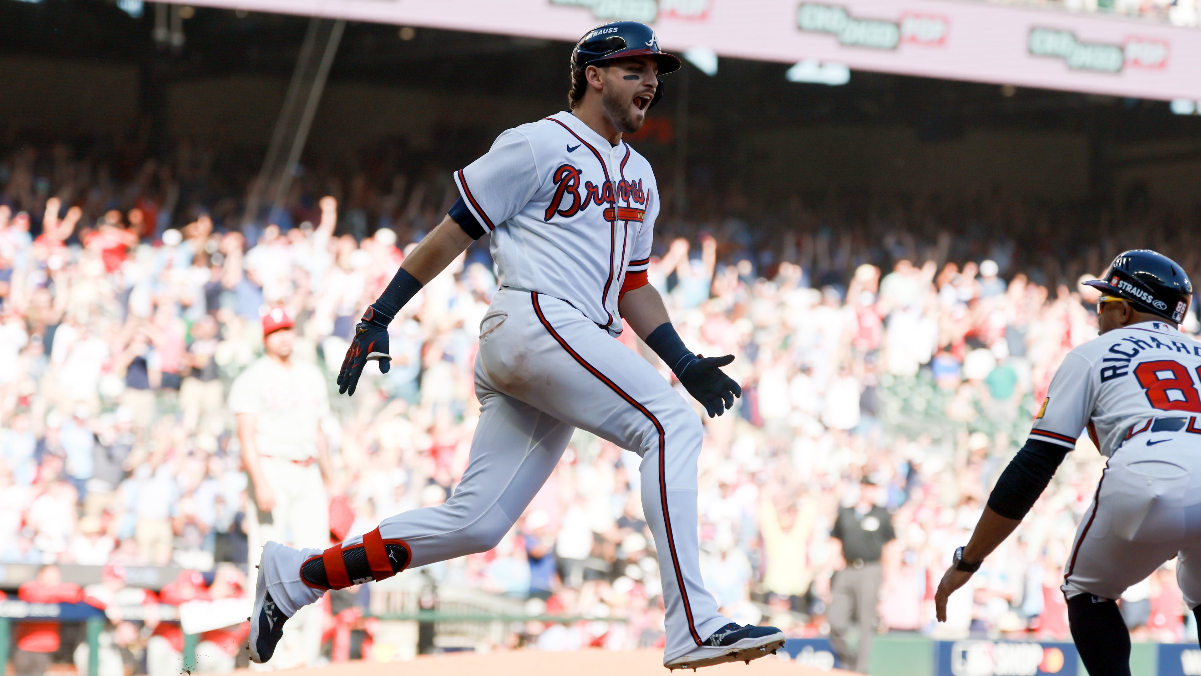 Braves third baseman Austin Riley rounds the bases after hitting a three-run home run in the eighth inning against the Phillies during Game 1 of their National League Wild Card series Tuesday, Sept. 29, 2026, in Atlanta. (Jason Getz/AJC)
