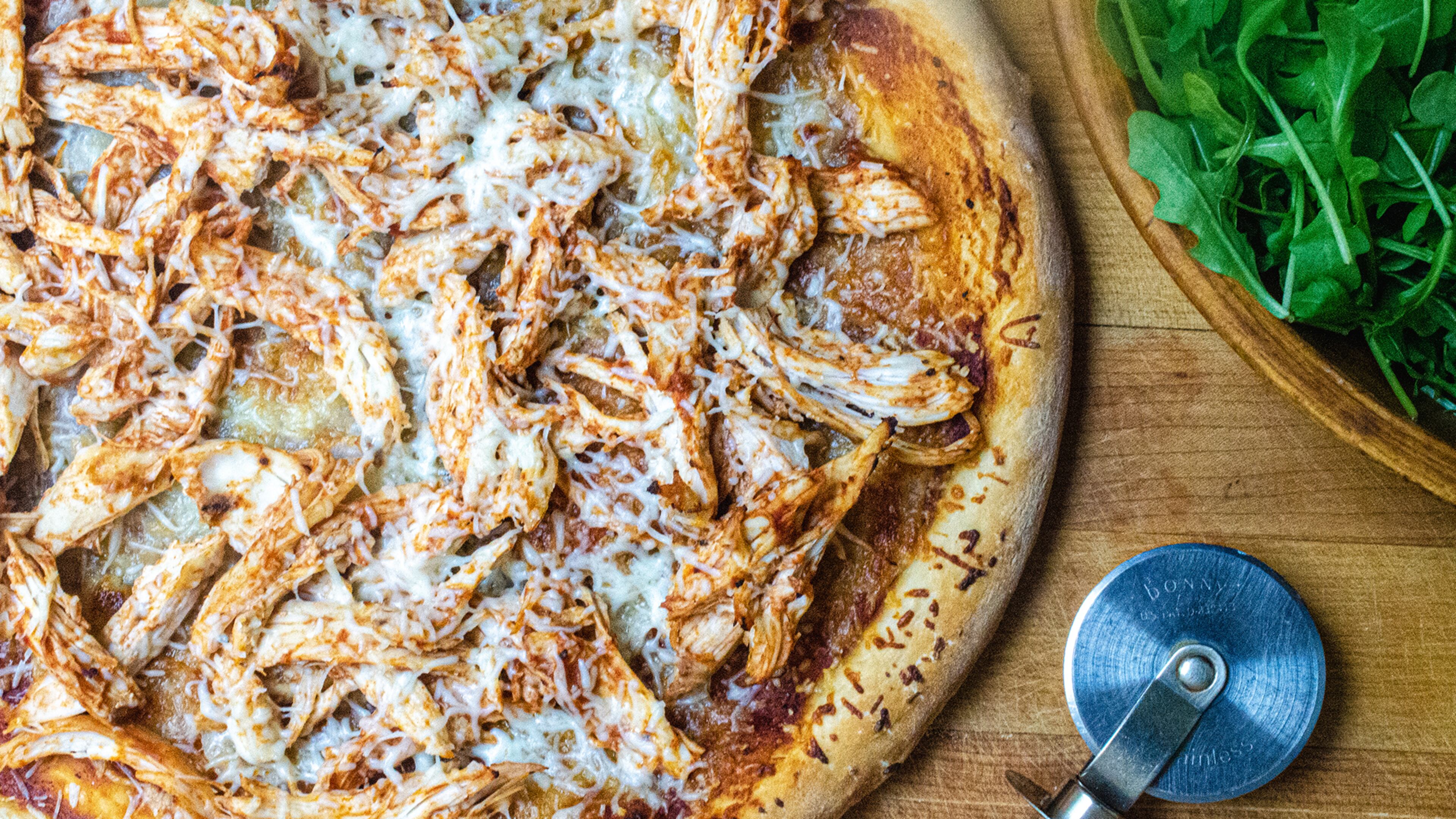Barbecue Chicken Pizza with an arugula side salad.
(Virginia Willis for The Atlanta Journal-Constitution)