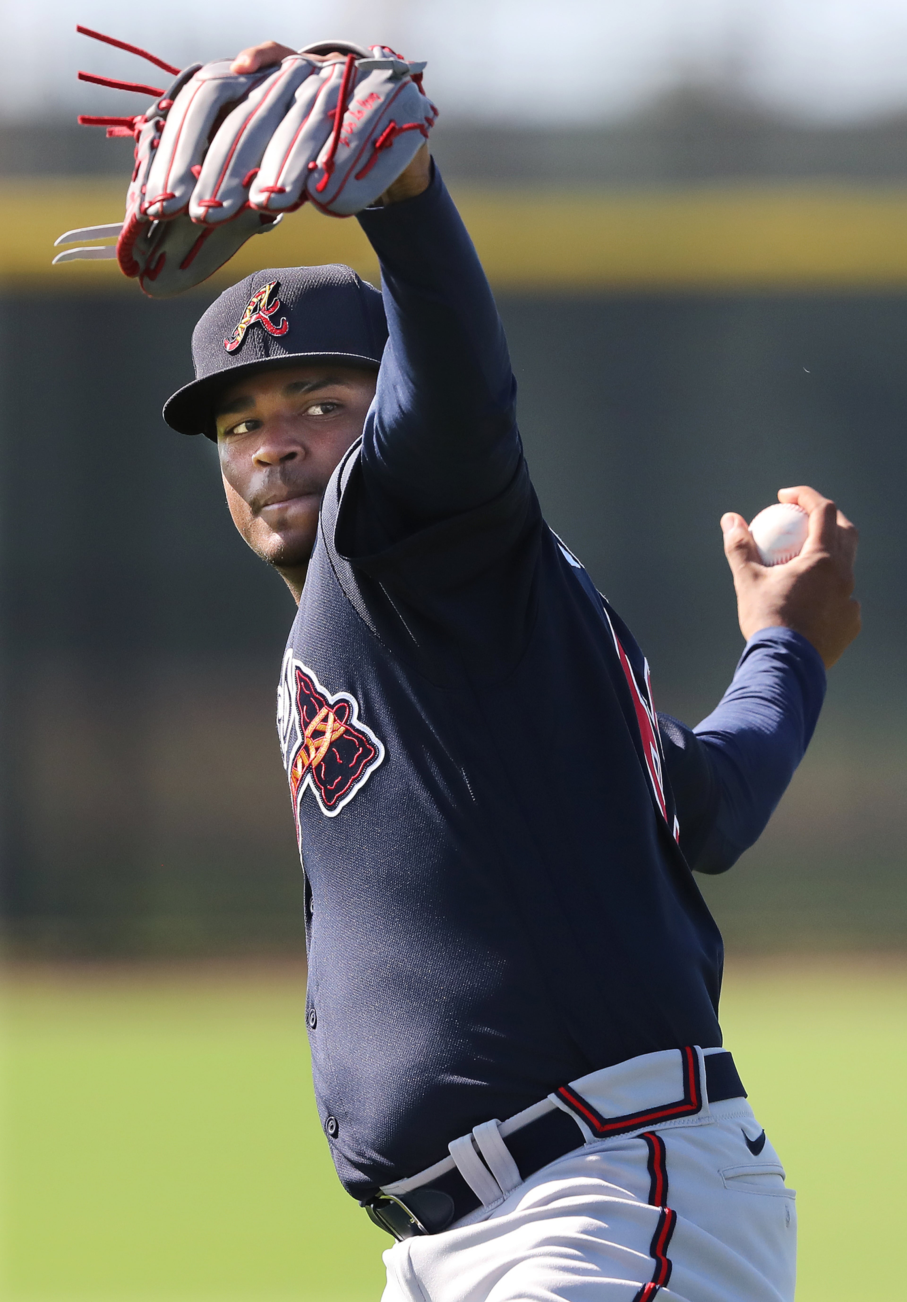 Braves pitcher Jasseel De La Cruz loosens up his arm during spring training on Saturday, Feb. 15, 2020, in North Port. Curtis Compton ccompton@ajc.com