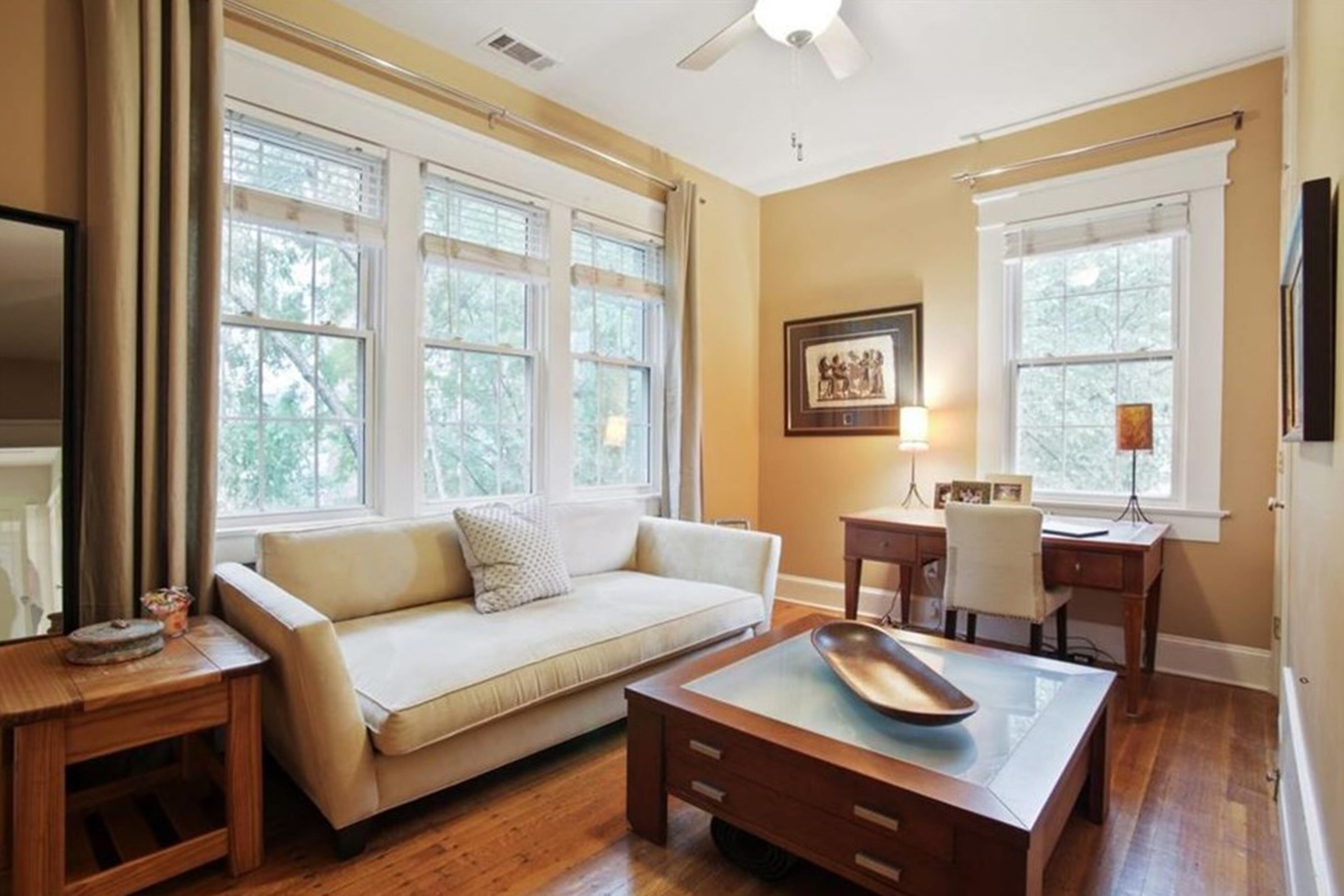 Presently used as a study and guest space, the third bedroom is a peaceful spot for reading, working or relaxing. Text by Julie Pedersen