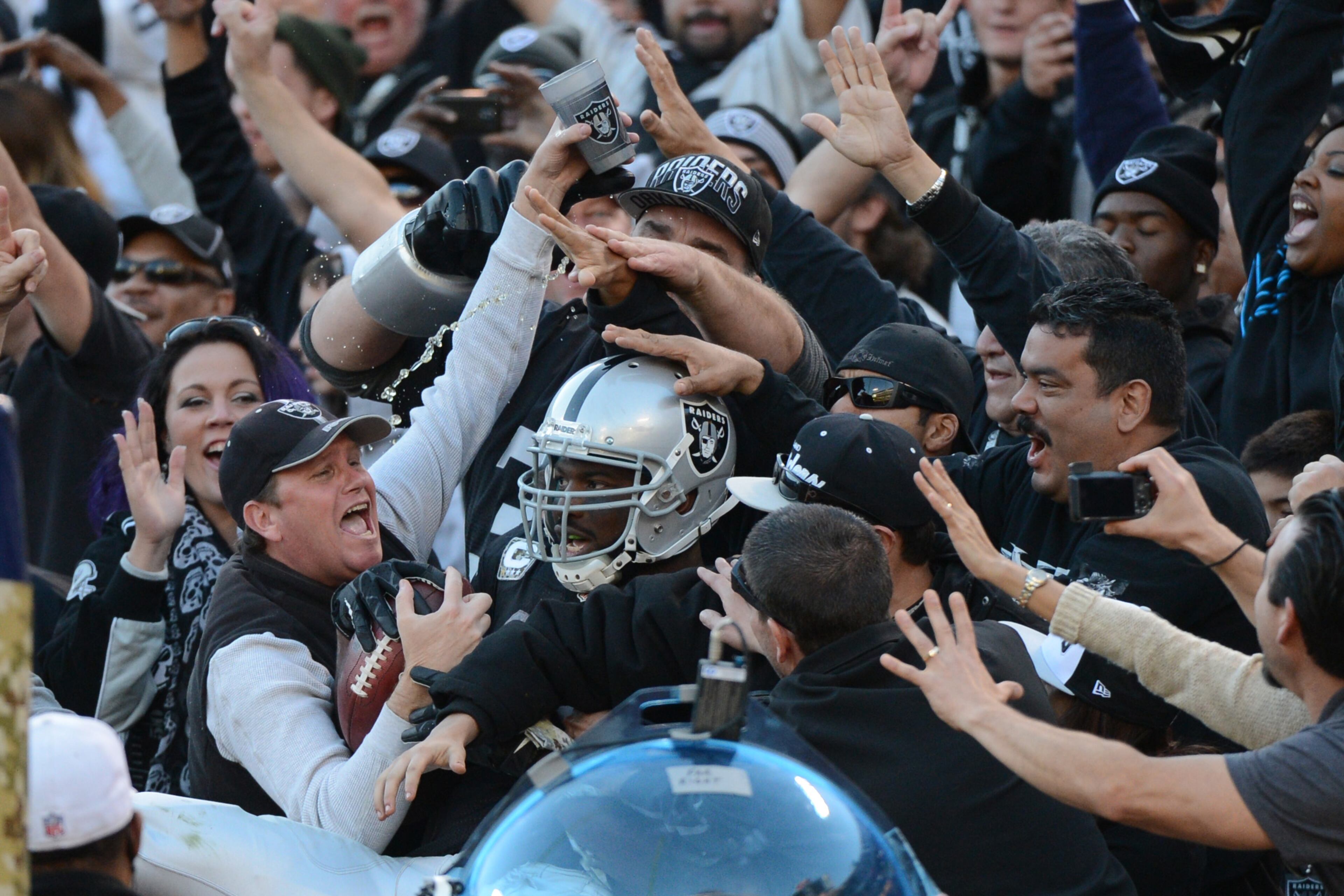 Oakland Raiders fullback Marcel Reece (45) celebrates with fans after scoring a touchdown against the Tennessee Titans during the fourth quarter at O.co Coliseum. The Titans defeated the Raiders 23-19. Mandatory Credit: Kyle Terada-USA TODAY Sports