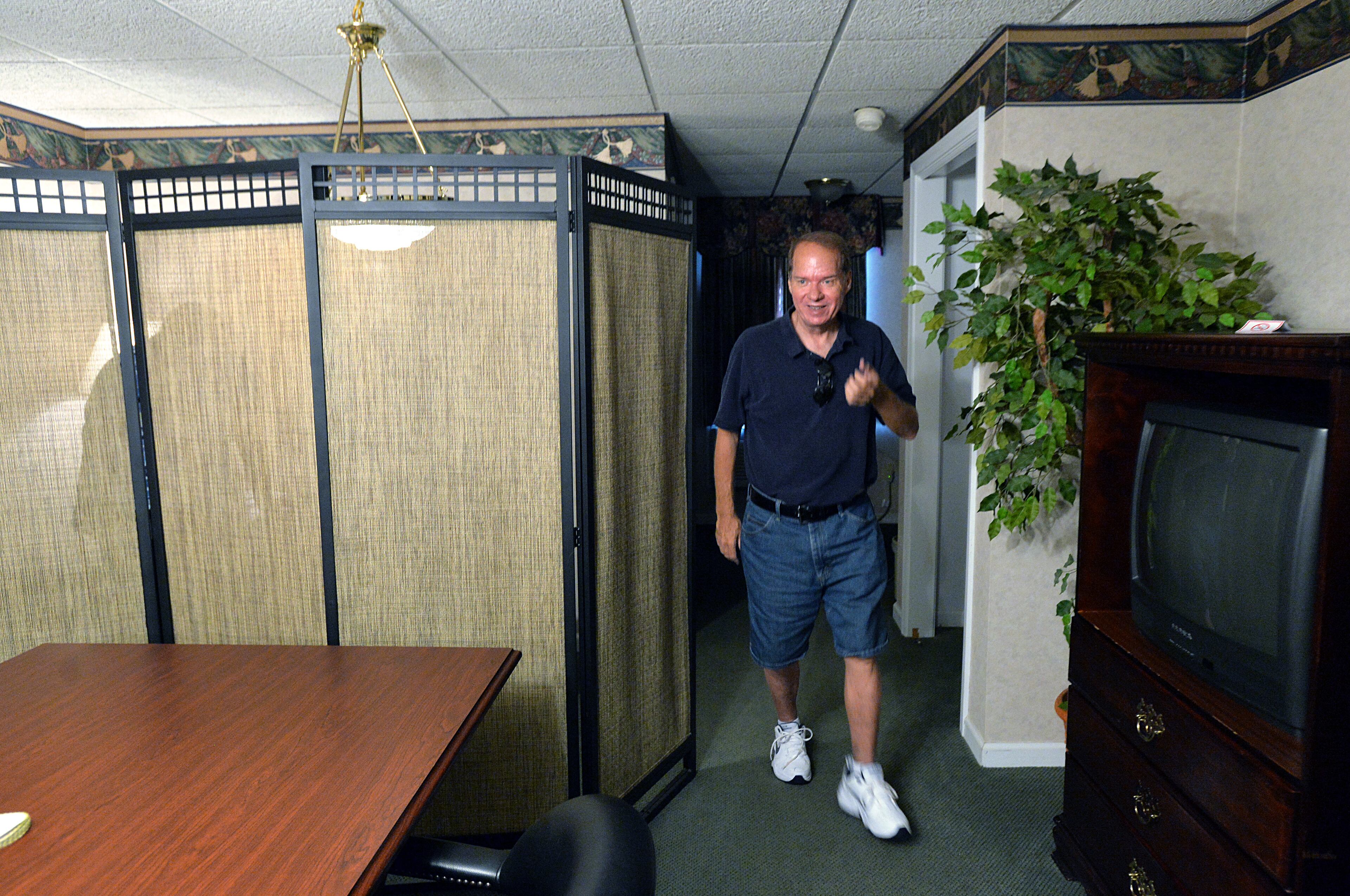Mark Eckenrode, of Orlando, Florida, who is one of about 200 babies who were sold from the Hicks' Clinic in the 1950s and 1960s, smiles after he had his DNA swab sampling done at Ocoee River Inn in Ducktown, Tennessee on Saturday, June 21, 2014. HYOSUB SHIN / HSHIN@AJC.COM