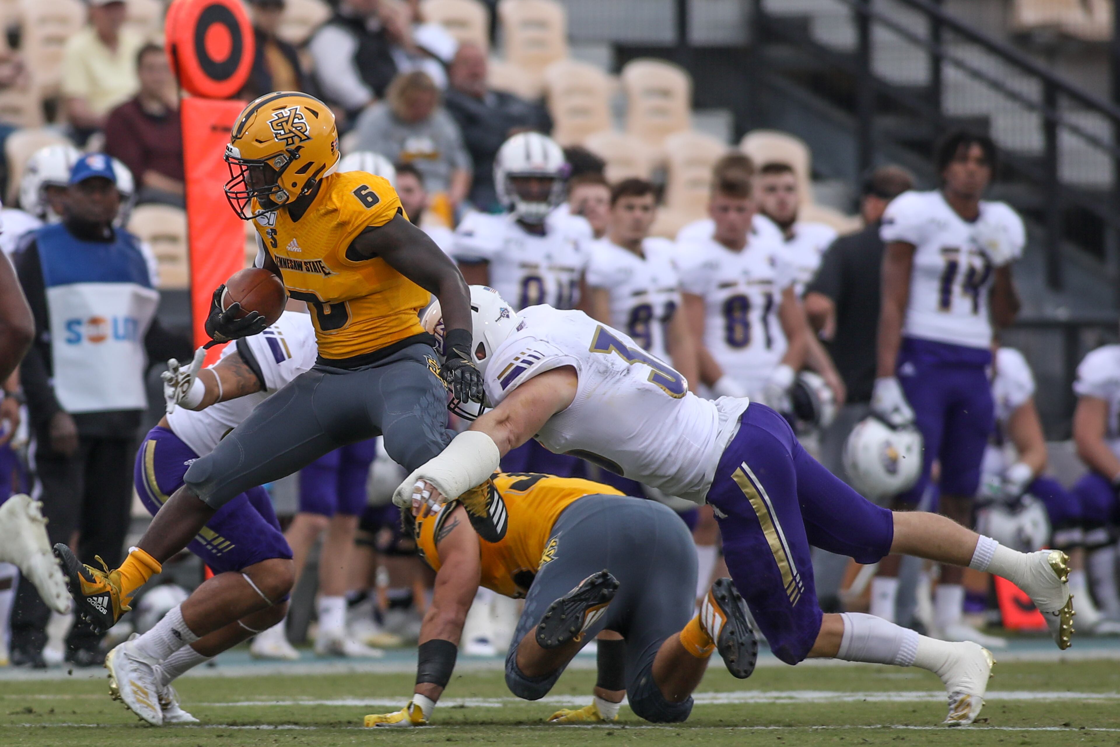 Kennesaw State Owls running back TJ Reed (6) runs the ball against North Alabama Lions at Fifth Third Bank Stadium, Saturday, Oct. 26, 2019, in Kennesaw, Ga. BRANDEN CAMP/SPECIAL