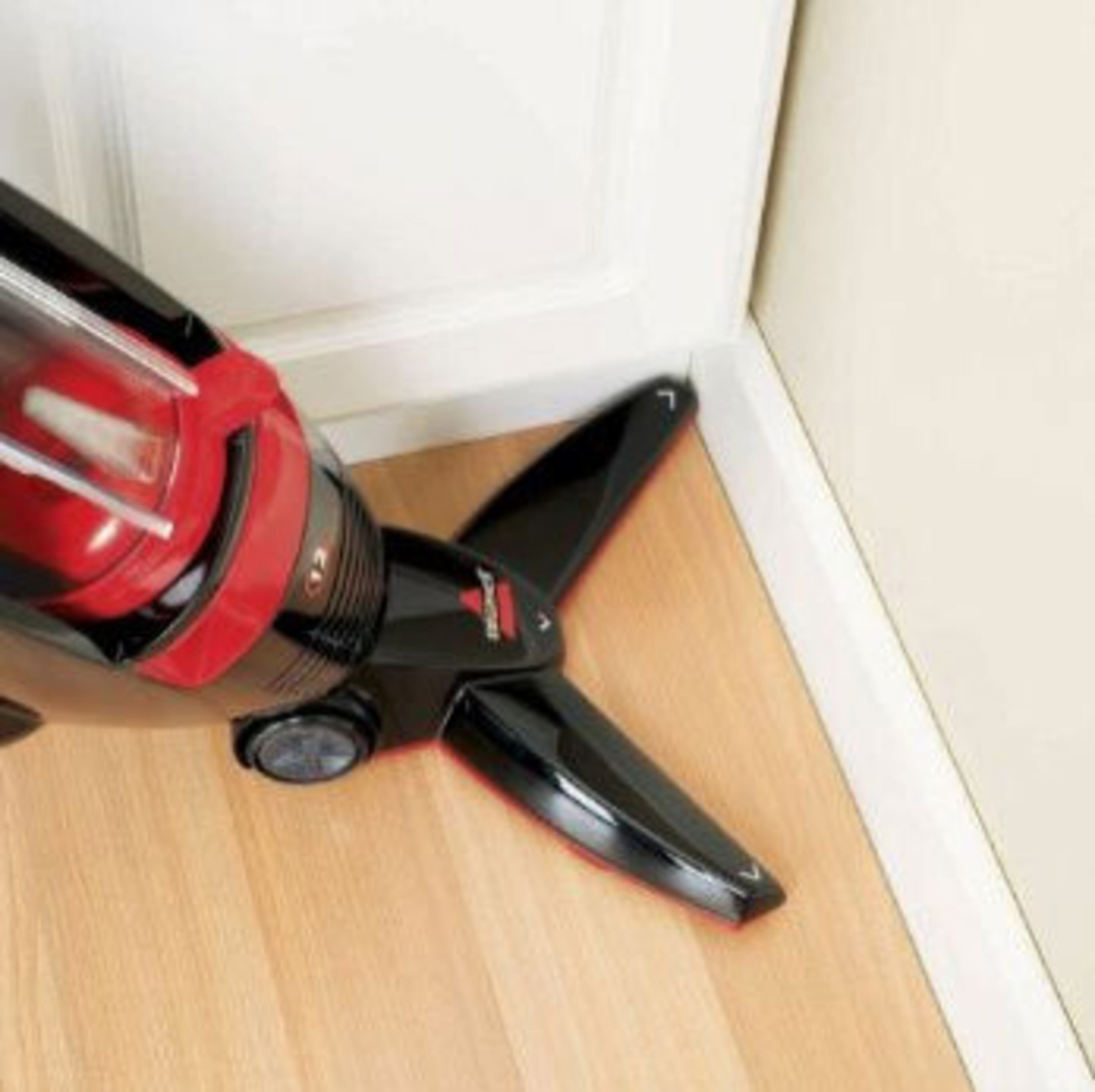 Bissell Versus Bare Floor Vacuum: This slim vac's V-shaped head gets into hard-to-reach nooks and crannies, in the corners, under baseboards and around furniture legs, channeling the mess in. In tests, it picked up 98 percent of dirt from tight spots regular vacuums tend to miss. $80