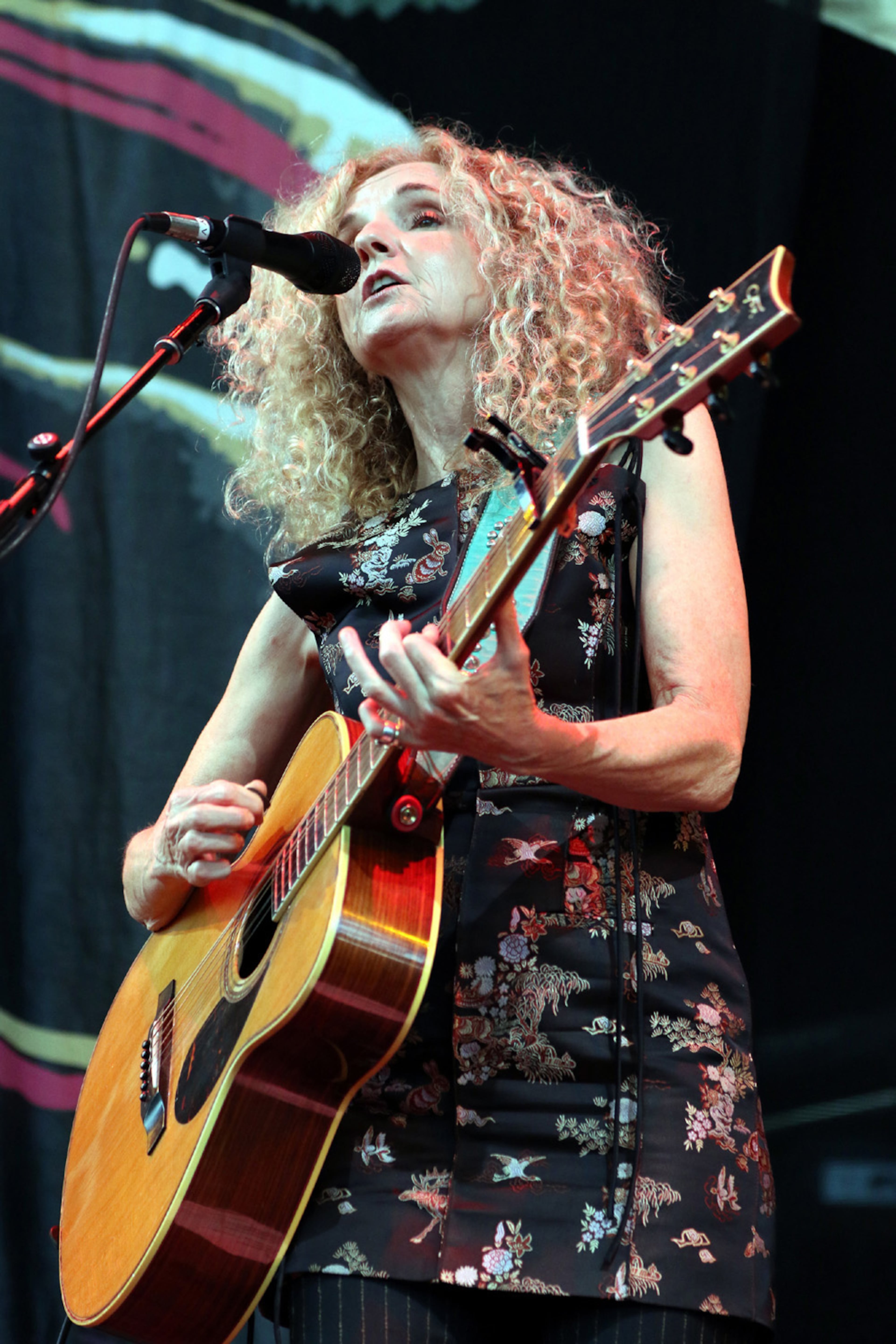 Patty Griffin performs as the opening act Saturday night, July 16, 2022, for the sold-out tour stop of The Chicks (formerly Dixie Chicks) at Ameris Bank Amphitheatre in Alpharetta. (Photo: Robb Cohen for The Atlanta Journal-Constitution)