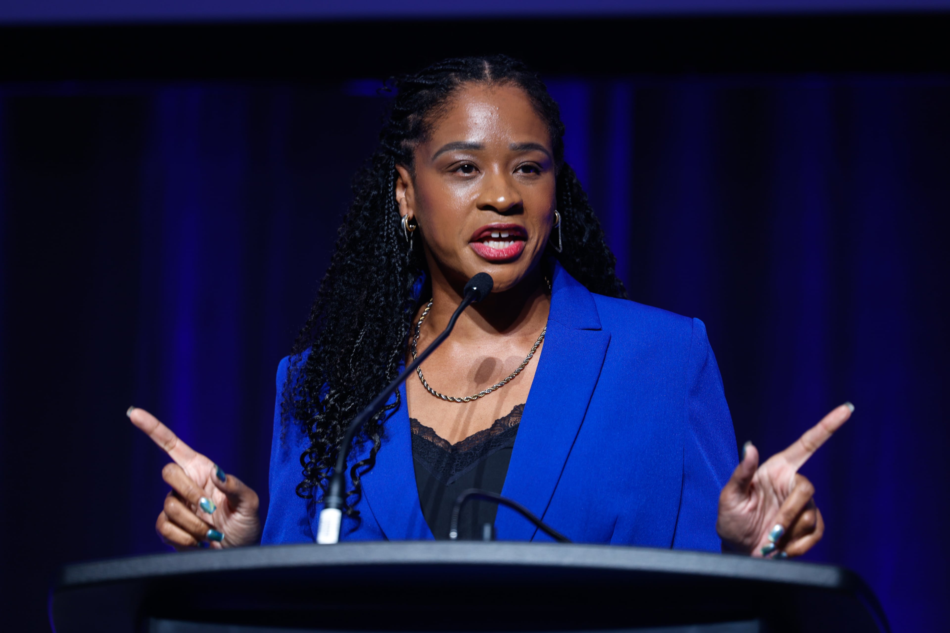 Democratic Congressional candidate Amanda Hollowell speaks at the Democratic Party of Georgia state convention at Savannah Convention Center in Savannah on Aug. 1, 2026. (Arvin Temkar/AJC)