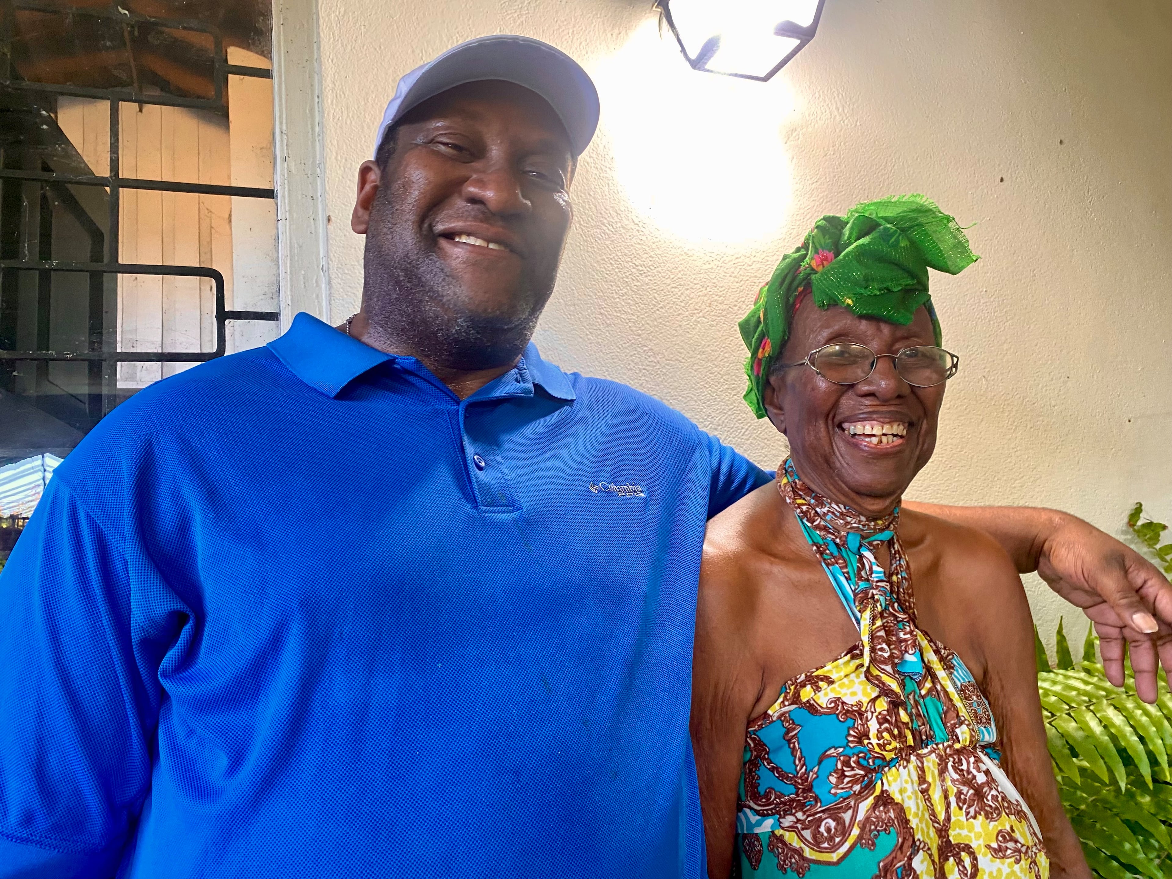 Jason Walker, president of Caribbean Georgia Vote, with his 91-year-old mother, Edna Walker, earlier this yearduring a visit in Kingston, Jamaica. (Courtesy Jason Walker)