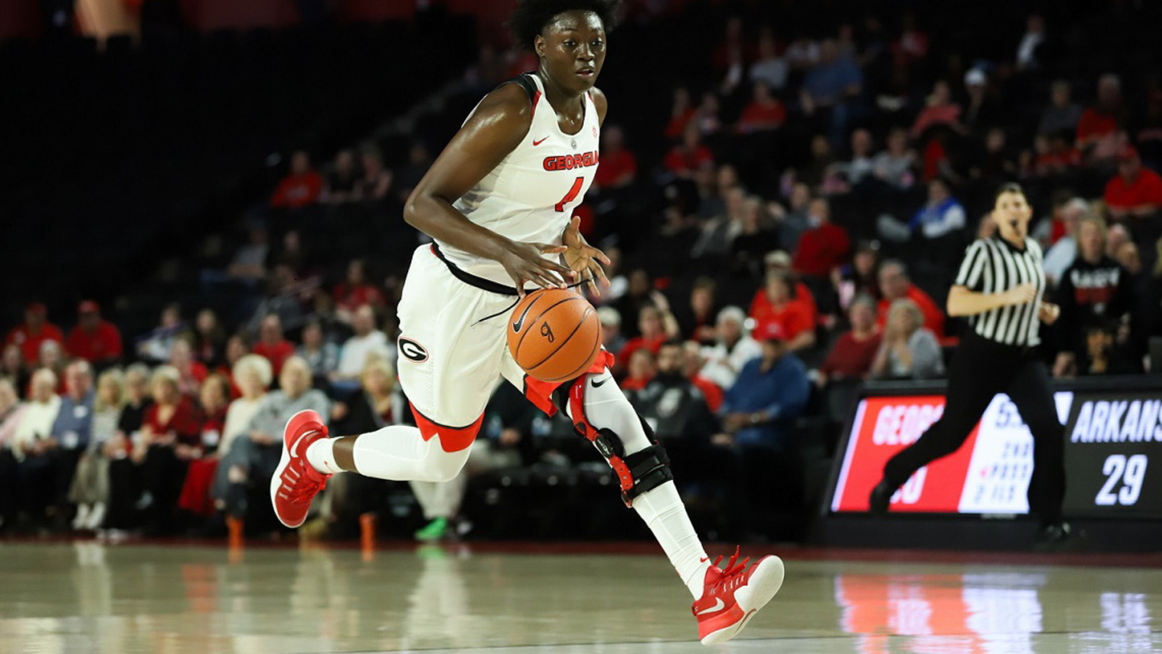 Georgia forward Caliya Robinson (4) dribbles down the court during a game between the University of Georgia and the University of Arkansas in Stegeman Coliseum in Athens, Ga., on Thursday, February 21, 2019. (Photo by Lauren Tolbert)