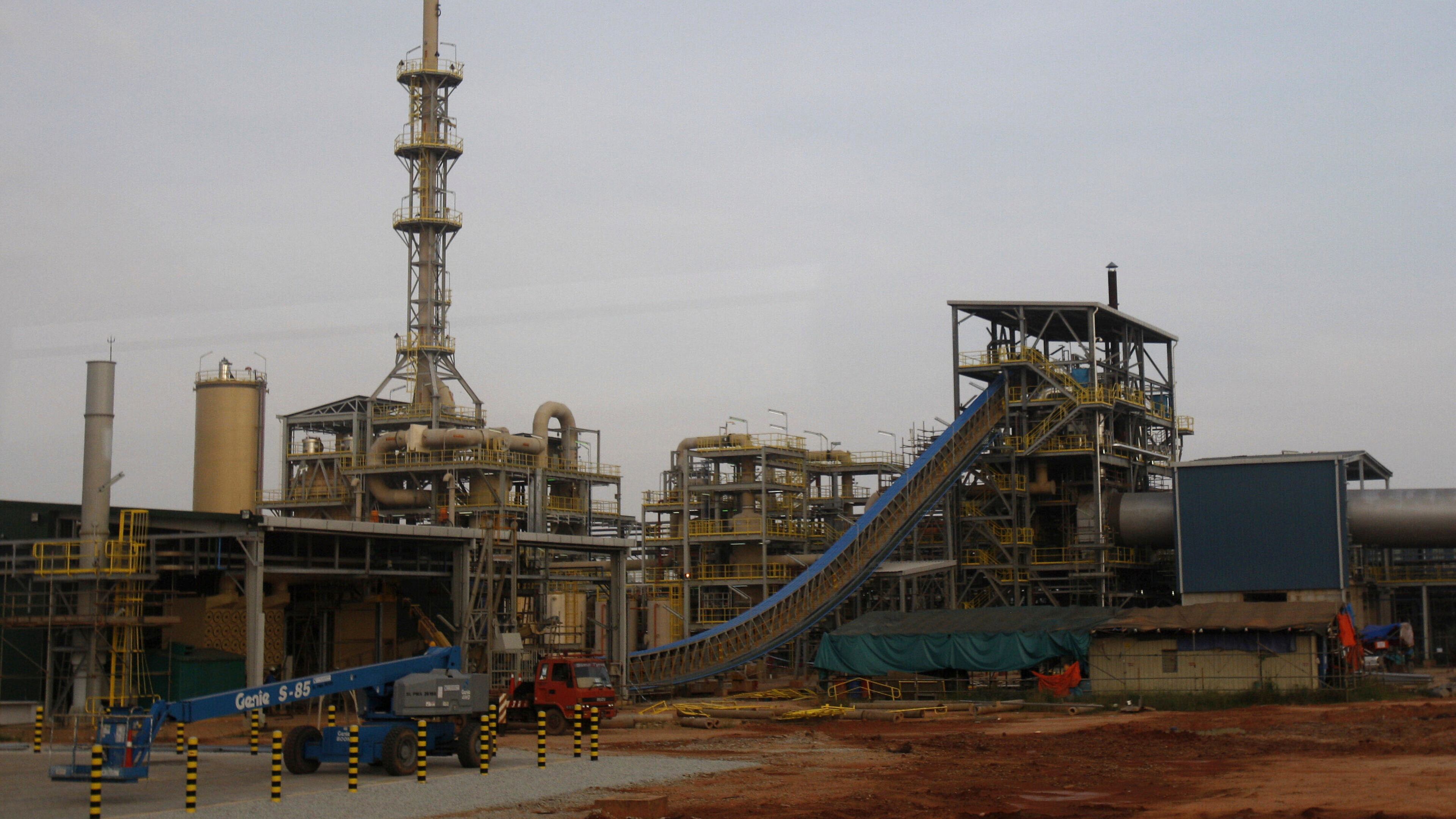 FILE - Construction vehicles are parked at the site of Lynas' rare earths plant in Gebeng, eastern Malaysia, on April 19, 2012. (AP Photo/Lai Seng Sin, File)