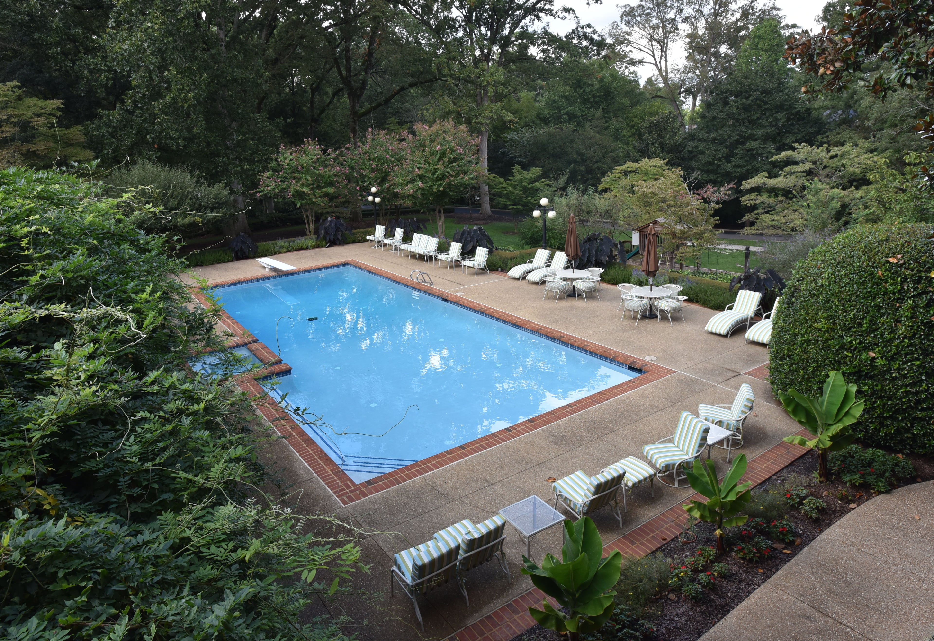 The swimming pool at the Governor's Mansion is seen on Wednesday, Sept. 9, 2015. HYOSUB SHIN / HSHIN@AJC.COM