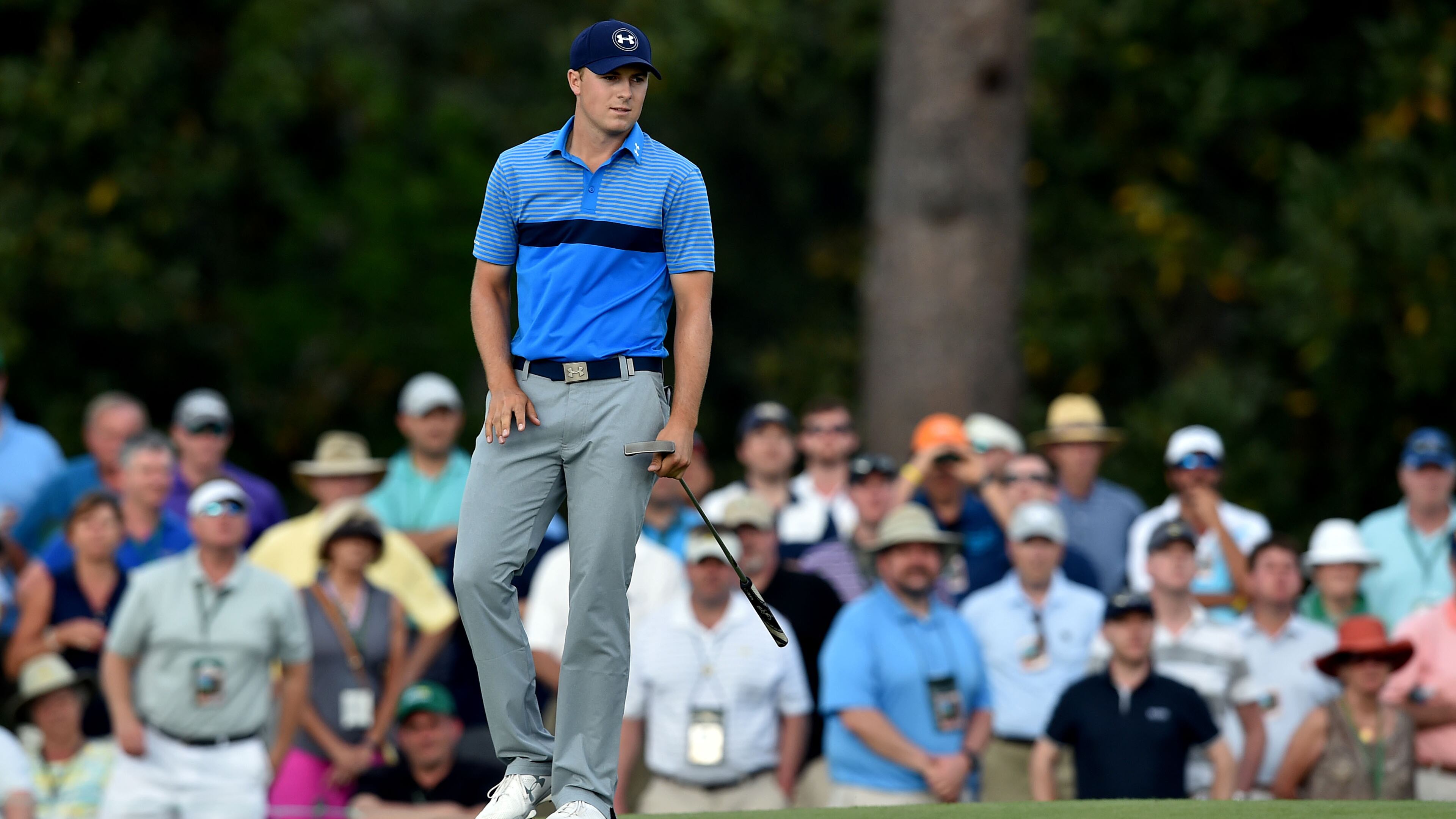 Jordan Spieth reacts to his putt on No. 17. Photos from the first round at the Masters on Thursday. BRANT SANDERLIN/BSANDERLIN@AJC.COM
